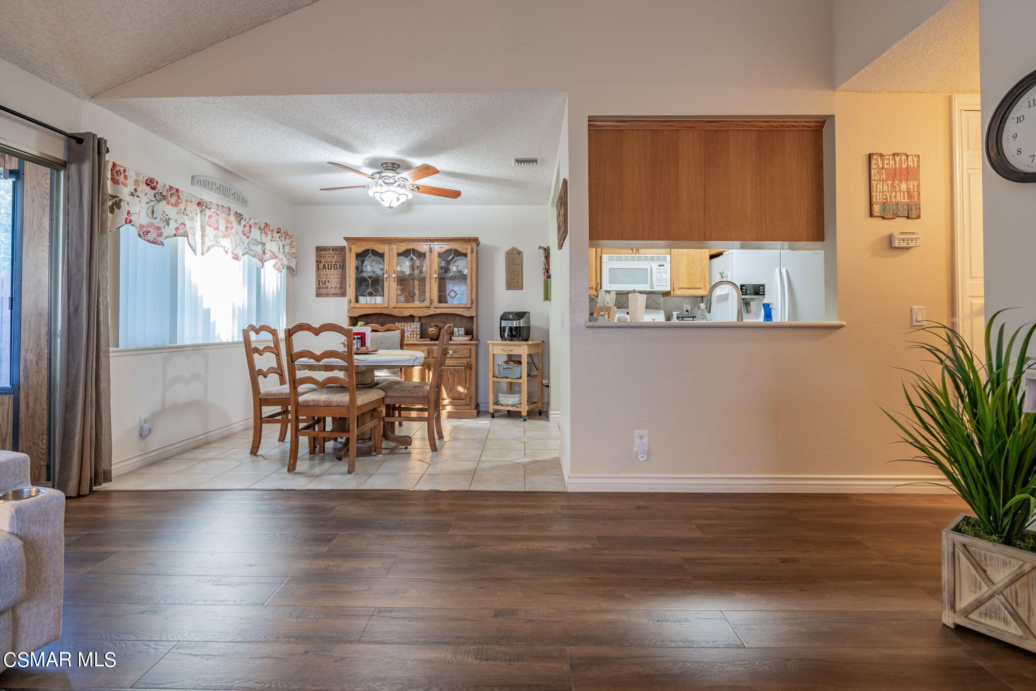 2044 Covington Avenue Simi Valley, CA 93065 - Photo 9 of 42 a view of a dining room with furniture window and wooden floor