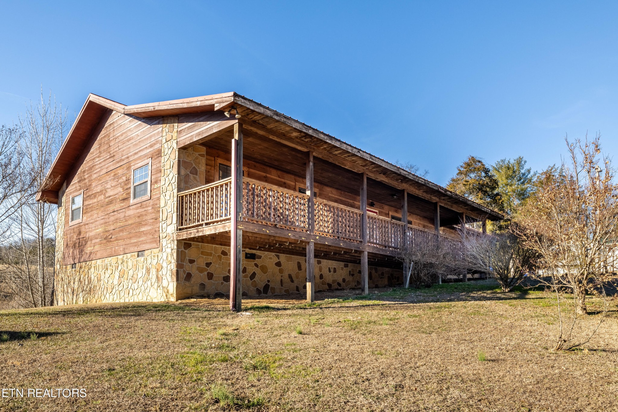 929 Robinson Gap Road Sevierville, TN 37876 - Photo 1 of 28 a front view of a house with a yard