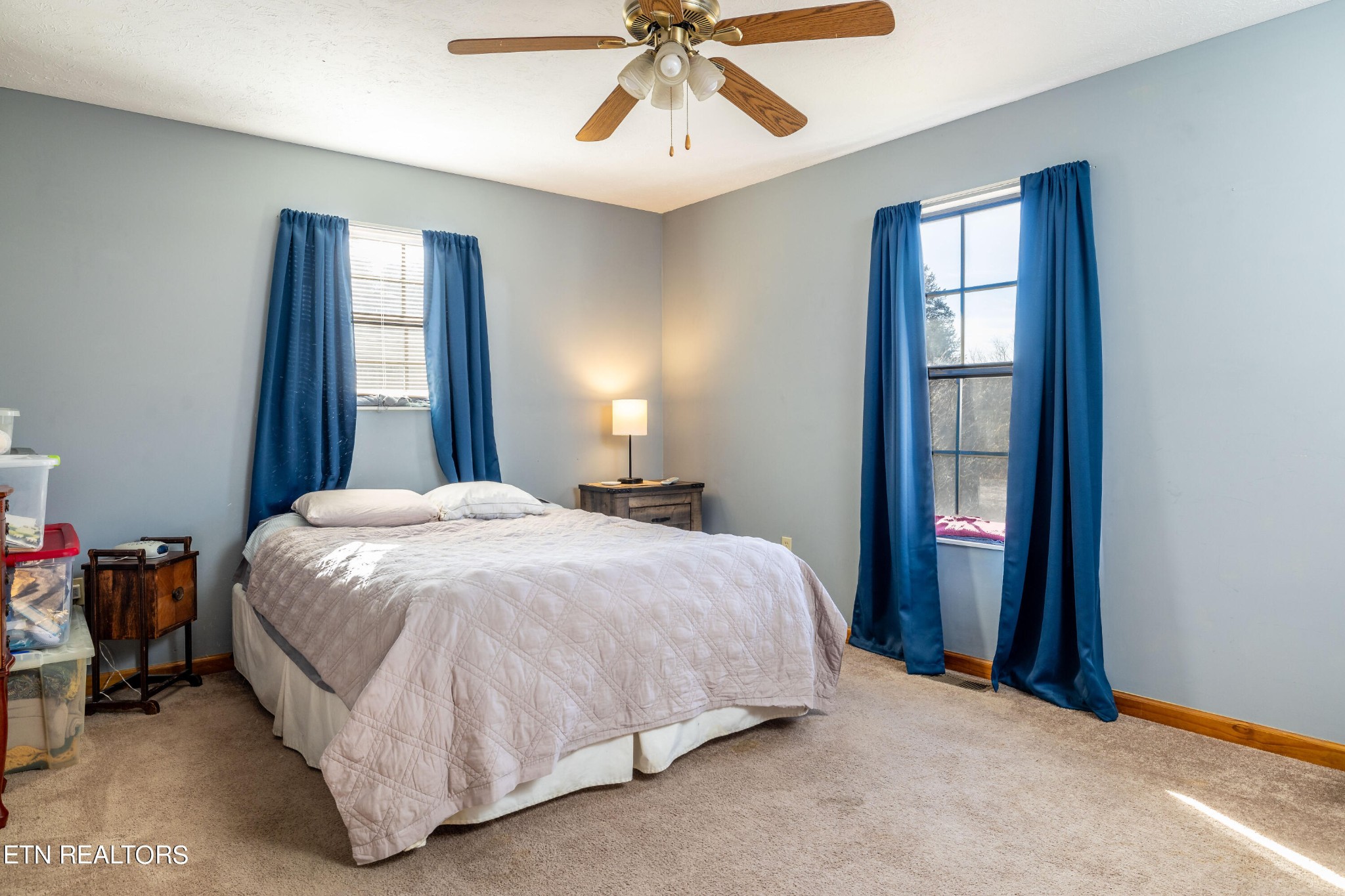 929 Robinson Gap Road Sevierville, TN 37876 - Photo 20 of 28 a bed sitting in a bedroom next to a window