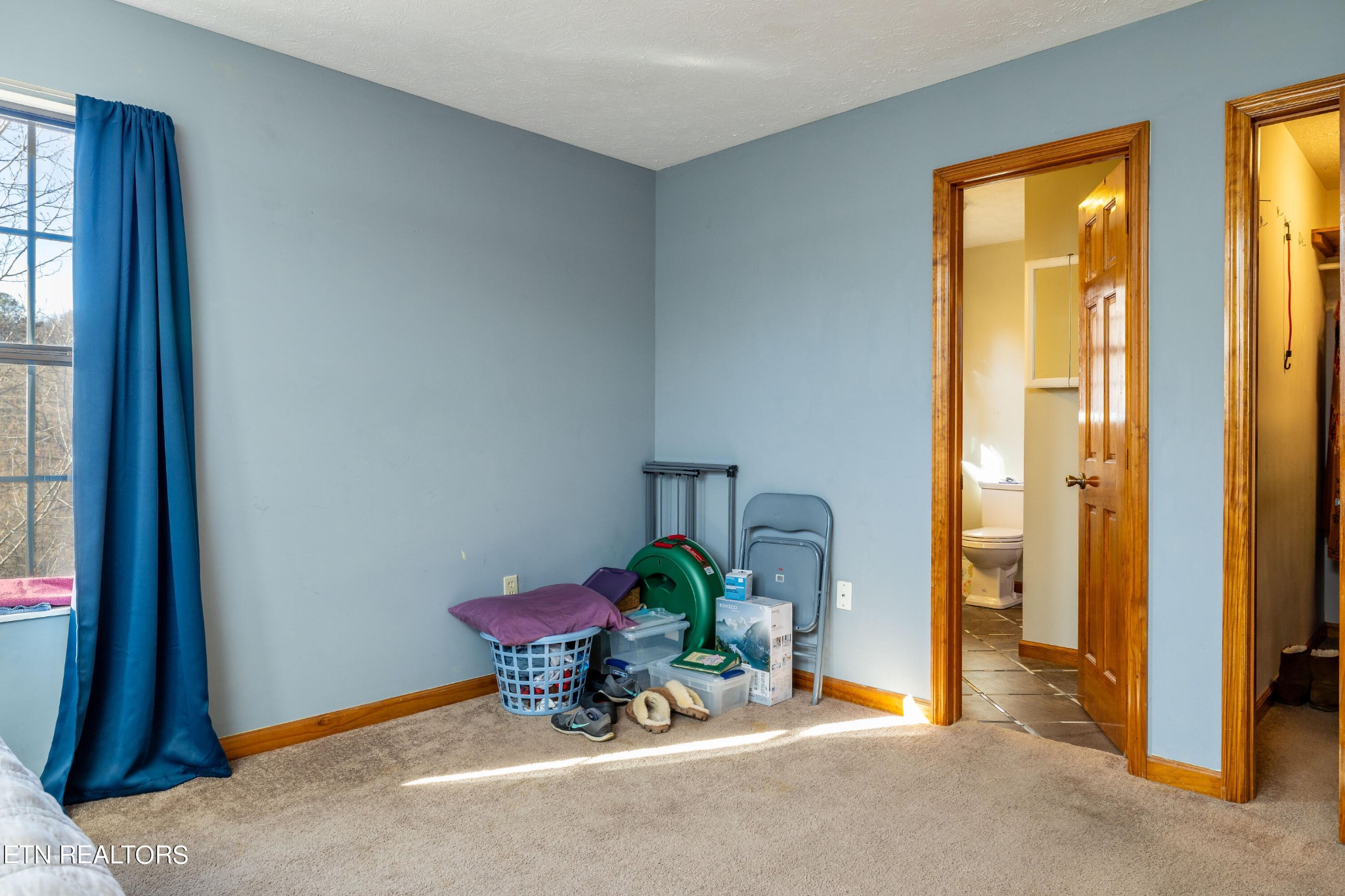 929 Robinson Gap Road Sevierville, TN 37876 - Photo 21 of 28 a view of a room that has a bench in it