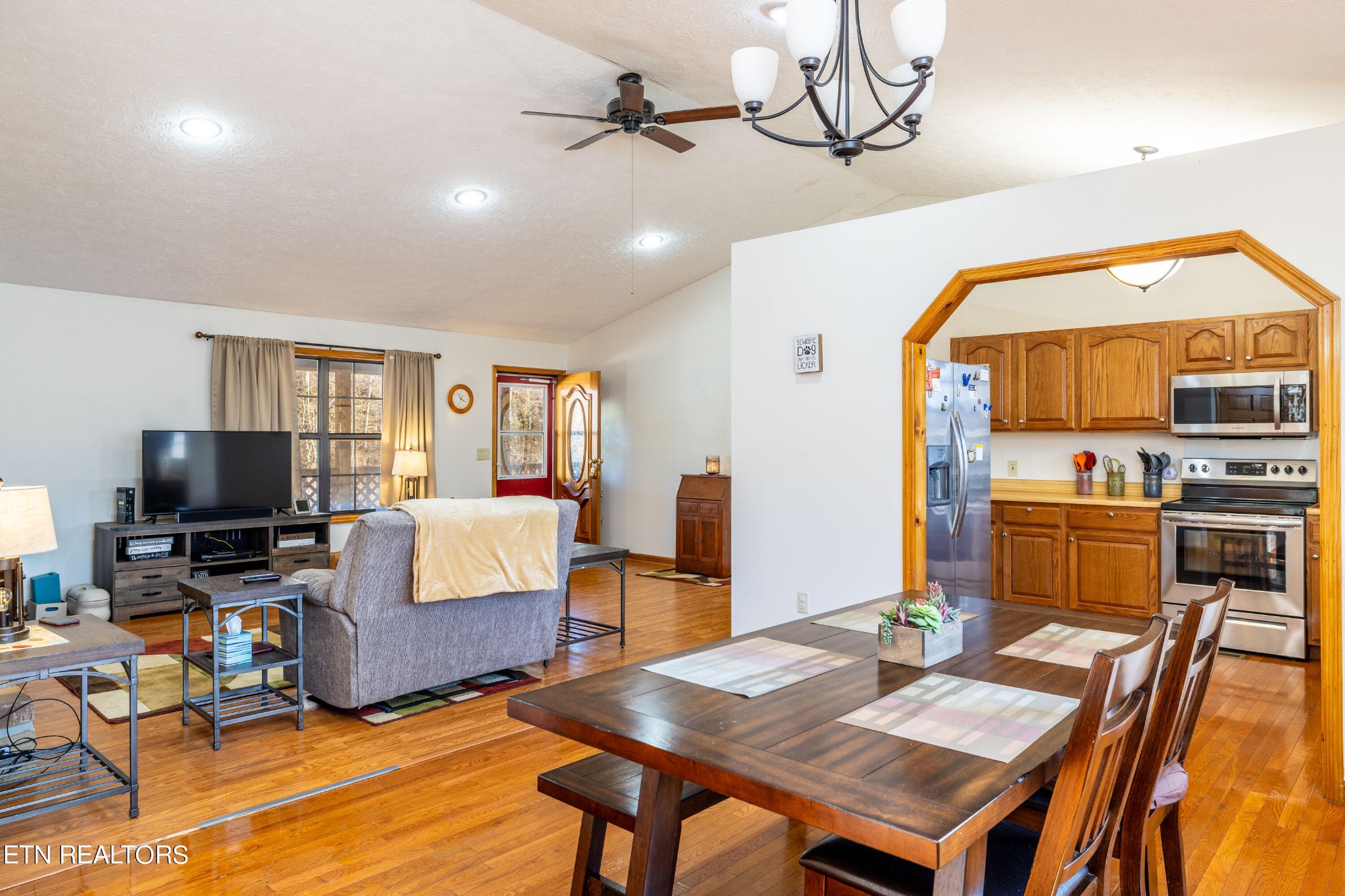 929 Robinson Gap Road Sevierville, TN 37876 - Photo 10 of 28 a living room with furniture and a flat screen tv
