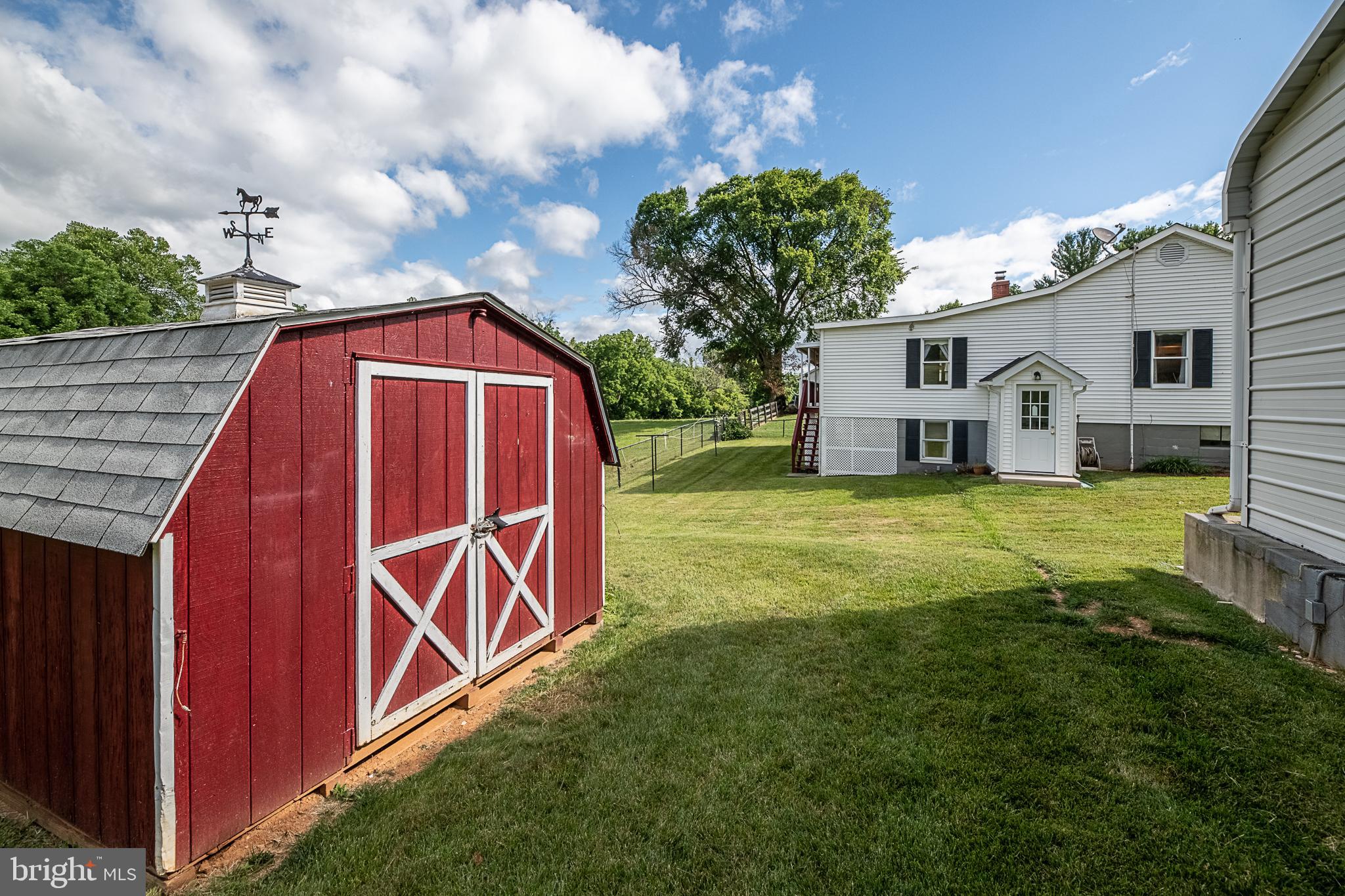 13125 Loyalty Road Leesburg, VA 20176 - Photo 53 of 58 Shed with back of house in background
