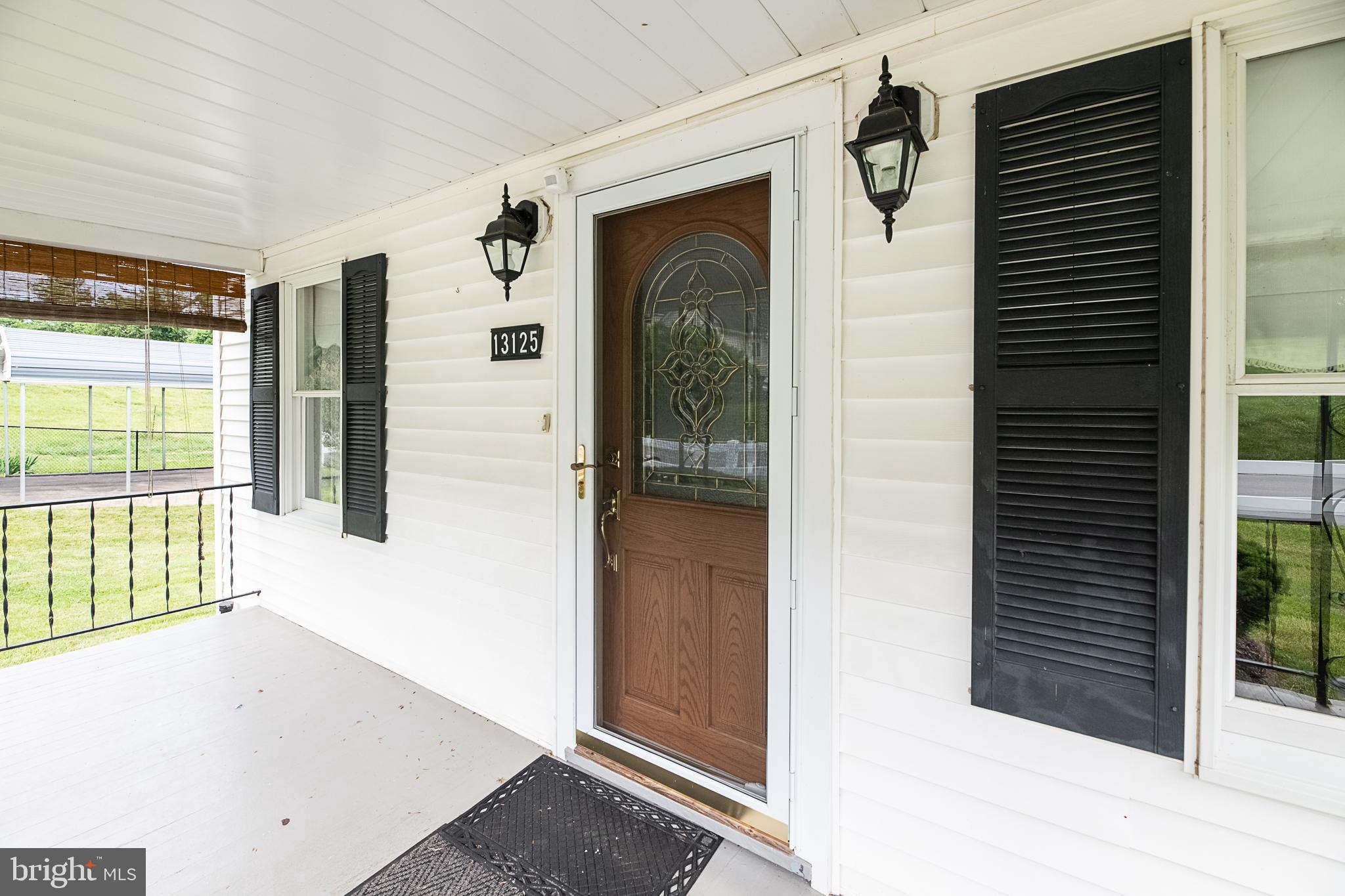 13125 Loyalty Road Leesburg, VA 20176 - Photo 8 of 58 Front porch with outdoor blinds