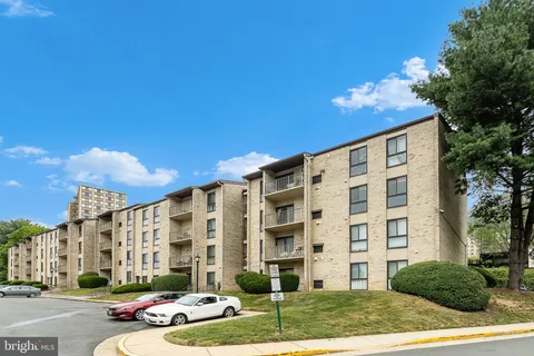 a front view of a building with street view