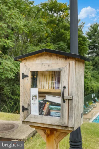 a view of house with pool yard and outdoor seating