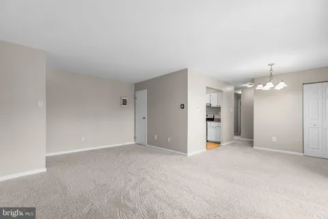an empty room with a bathroom