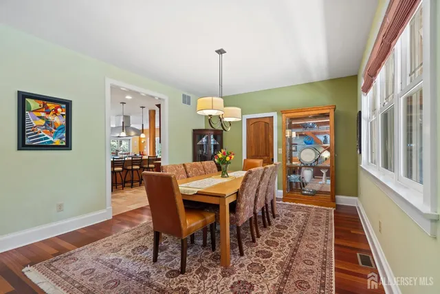 a spacious bedroom with a bed and a couch