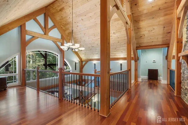 a bathroom with a double vanity sink toilet and mirror
