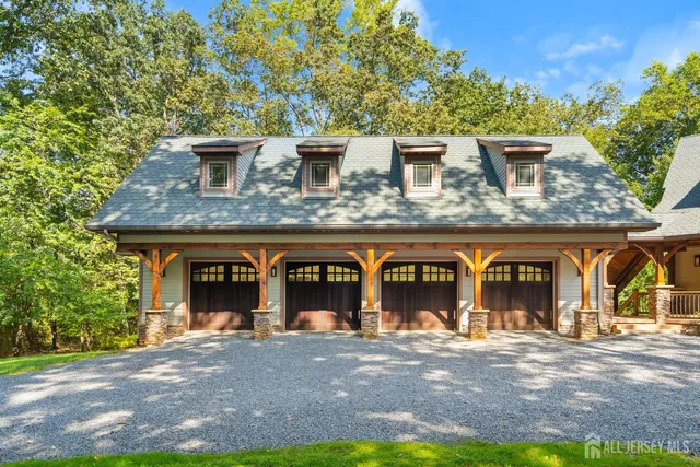 a living room with fireplace furniture and a flat screen tv