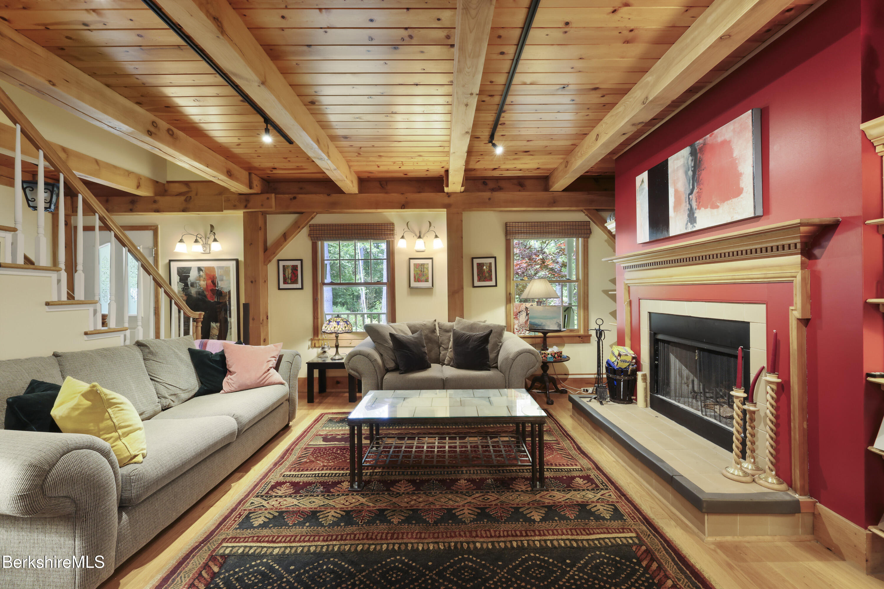 169 Jacobs Hollow Road Becket, MA 01223 - Photo 17 of 73 a living room with furniture and a fireplace