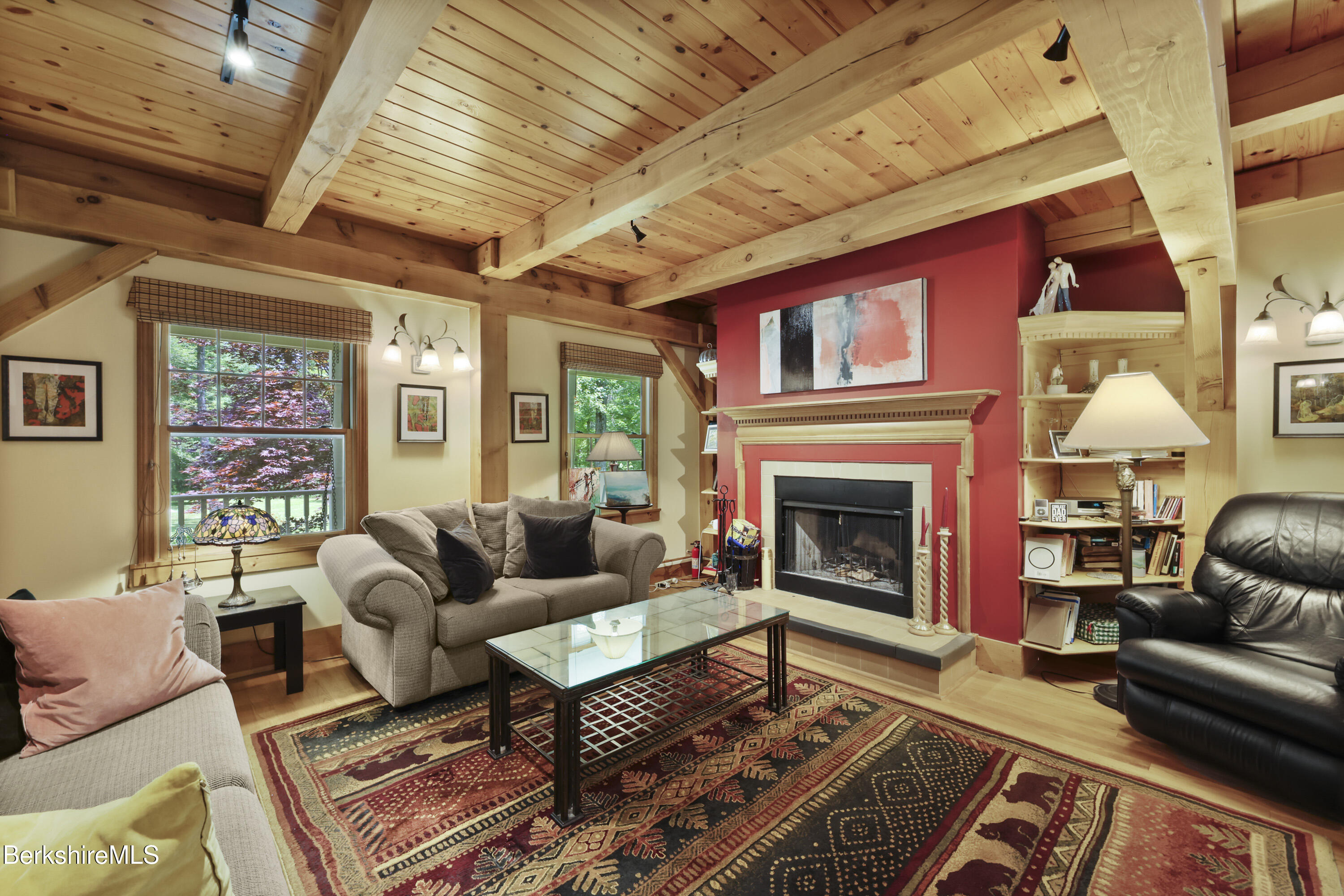 169 Jacobs Hollow Road Becket, MA 01223 - Photo 18 of 73 a living room with furniture and a fireplace