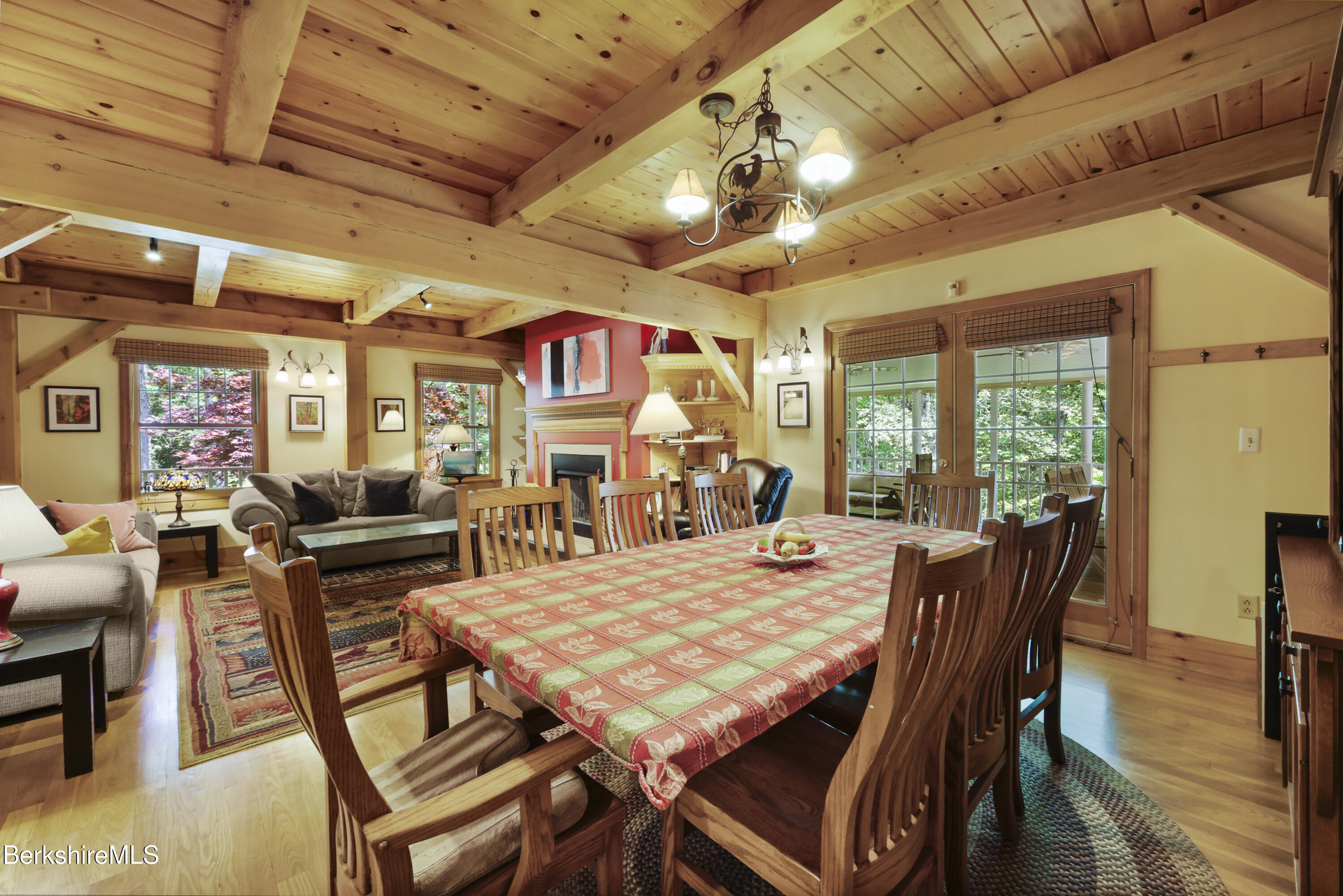 169 Jacobs Hollow Road Becket, MA 01223 - Photo 20 of 73 a view of a dining room with furniture window and wooden floor