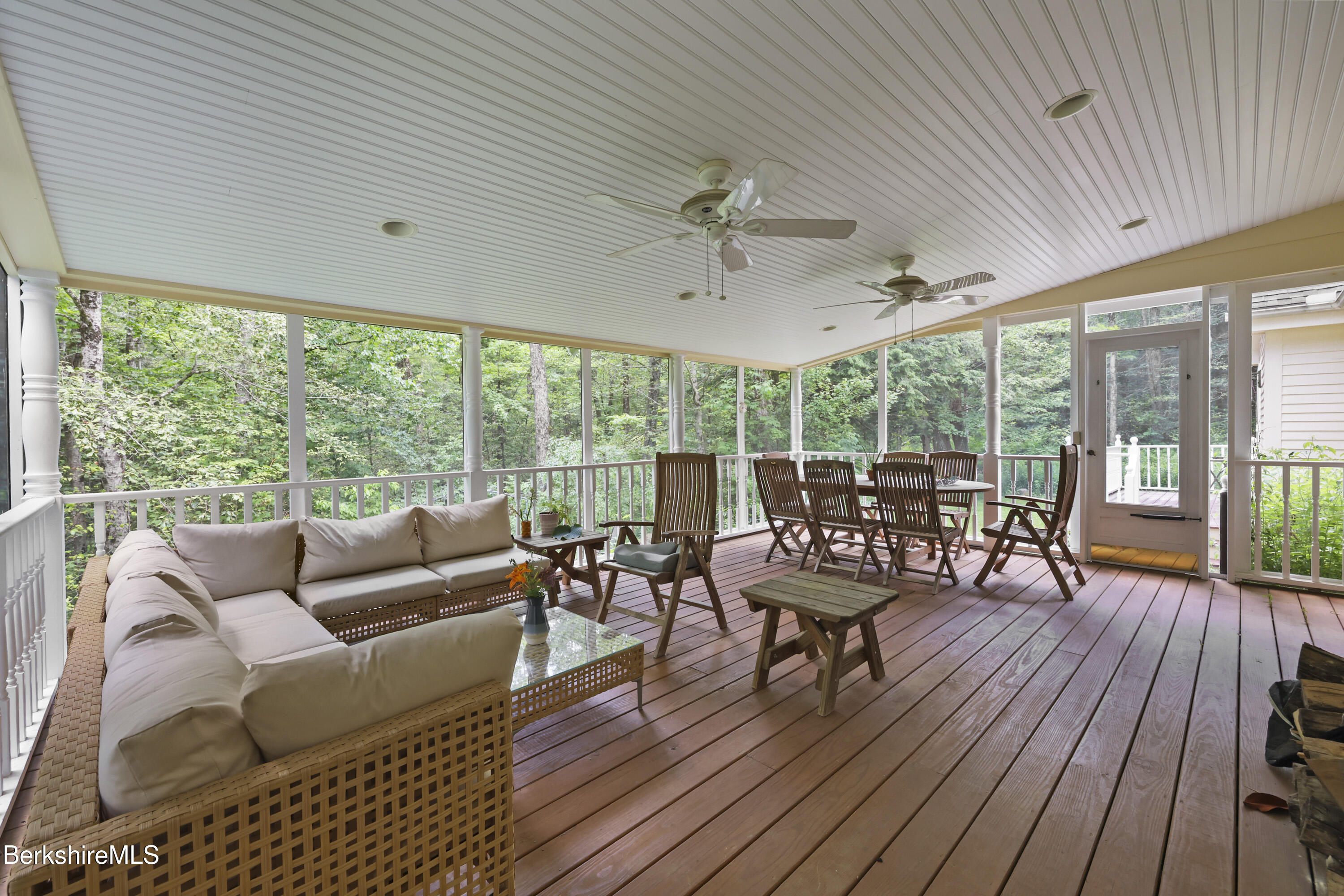 169 Jacobs Hollow Road Becket, MA 01223 - Photo 30 of 73 a living room with furniture and a wooden floor