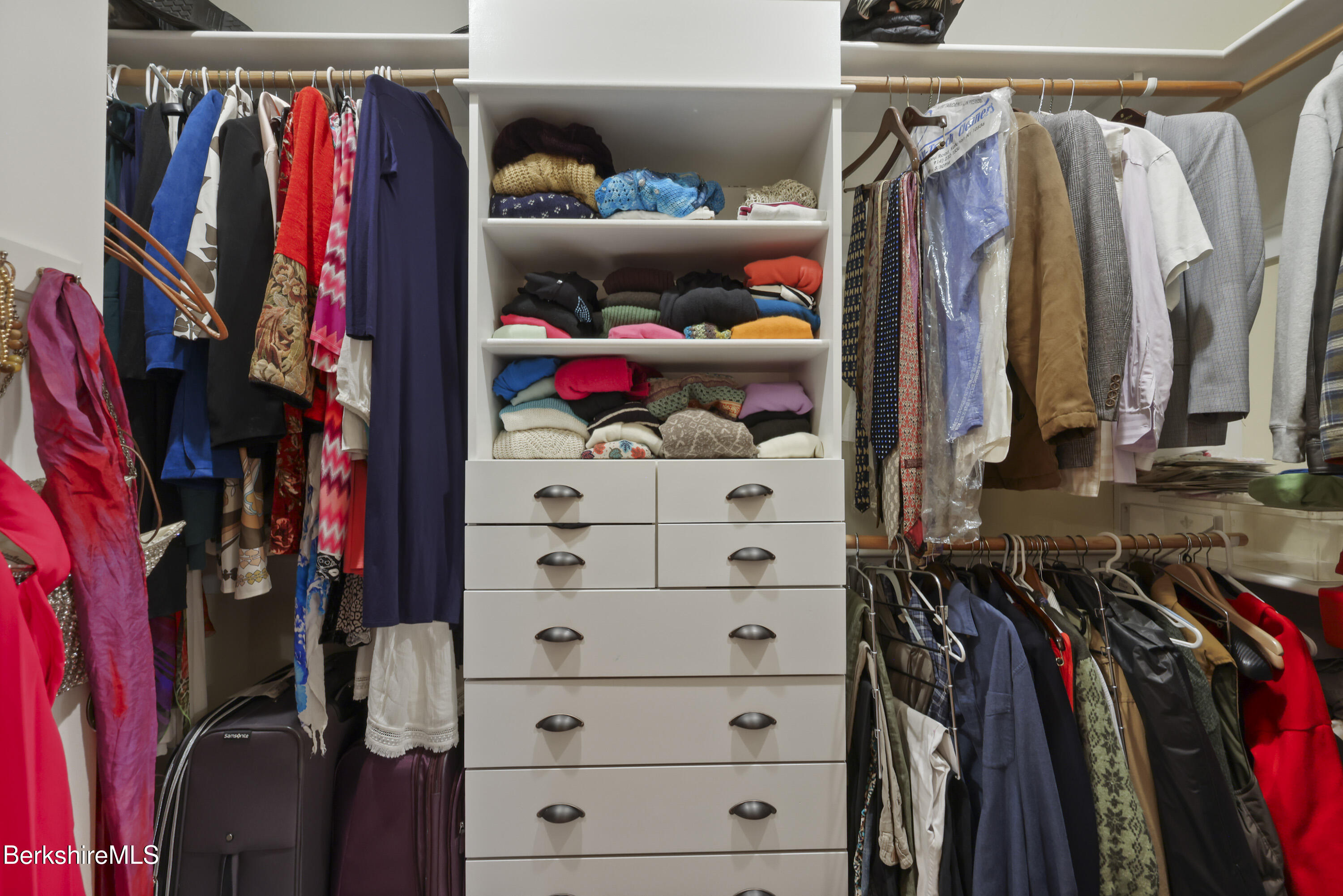 169 Jacobs Hollow Road Becket, MA 01223 - Photo 38 of 73 a view of walk in closet with clothes