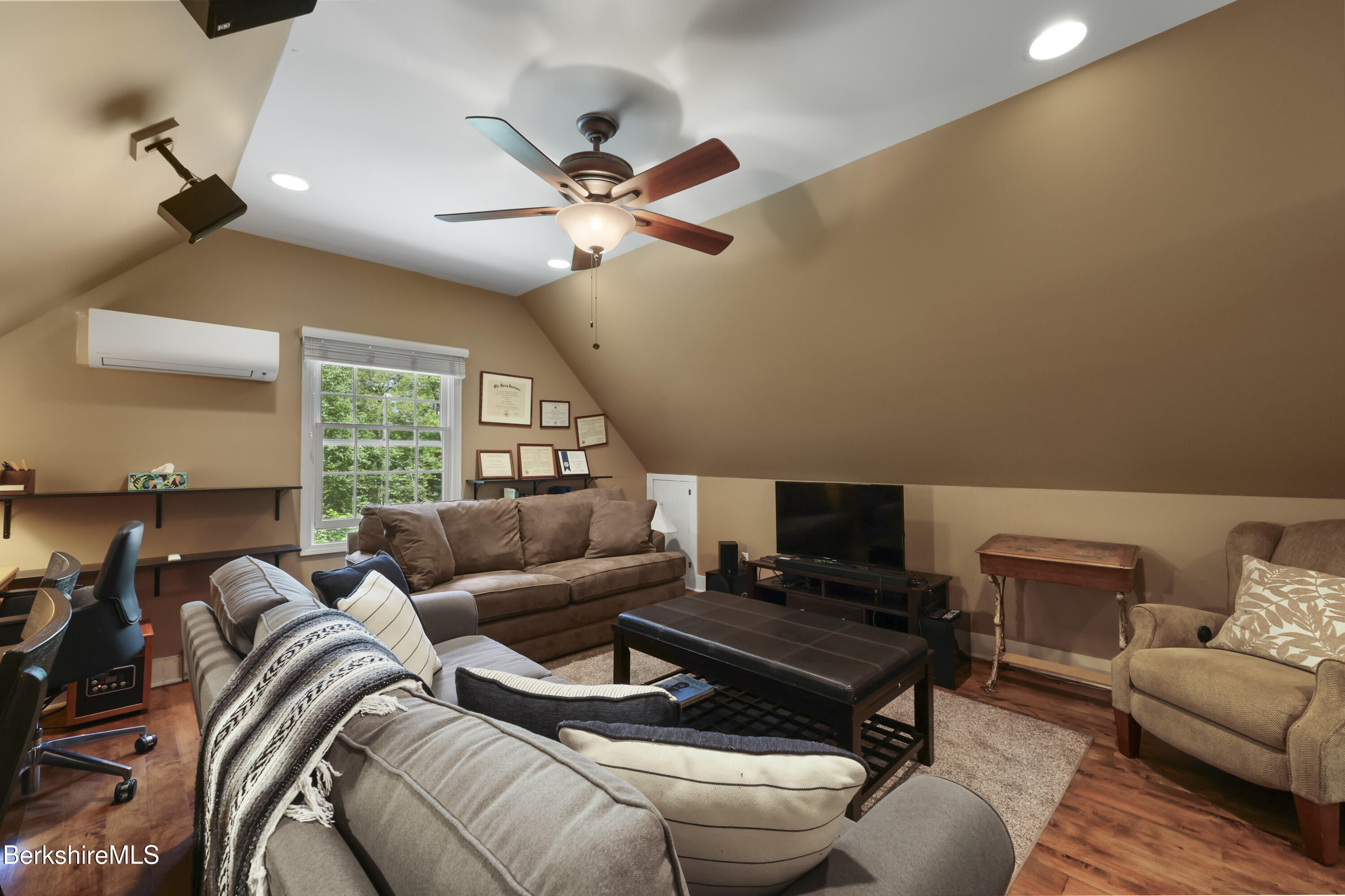 169 Jacobs Hollow Road Becket, MA 01223 - Photo 61 of 73 a living room with furniture and a window