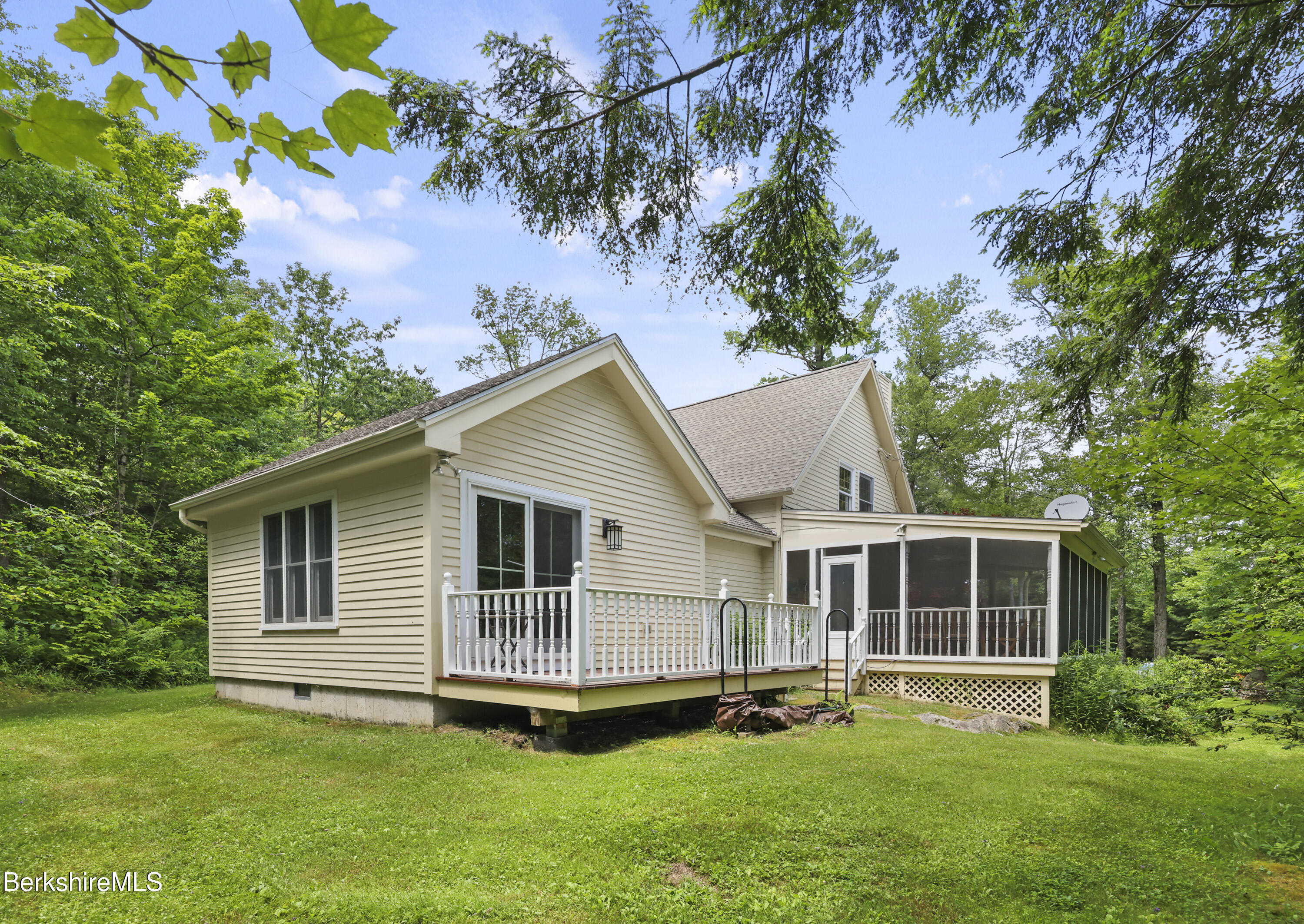 169 Jacobs Hollow Road Becket, MA 01223 - Photo 70 of 73 a view of a house with a yard