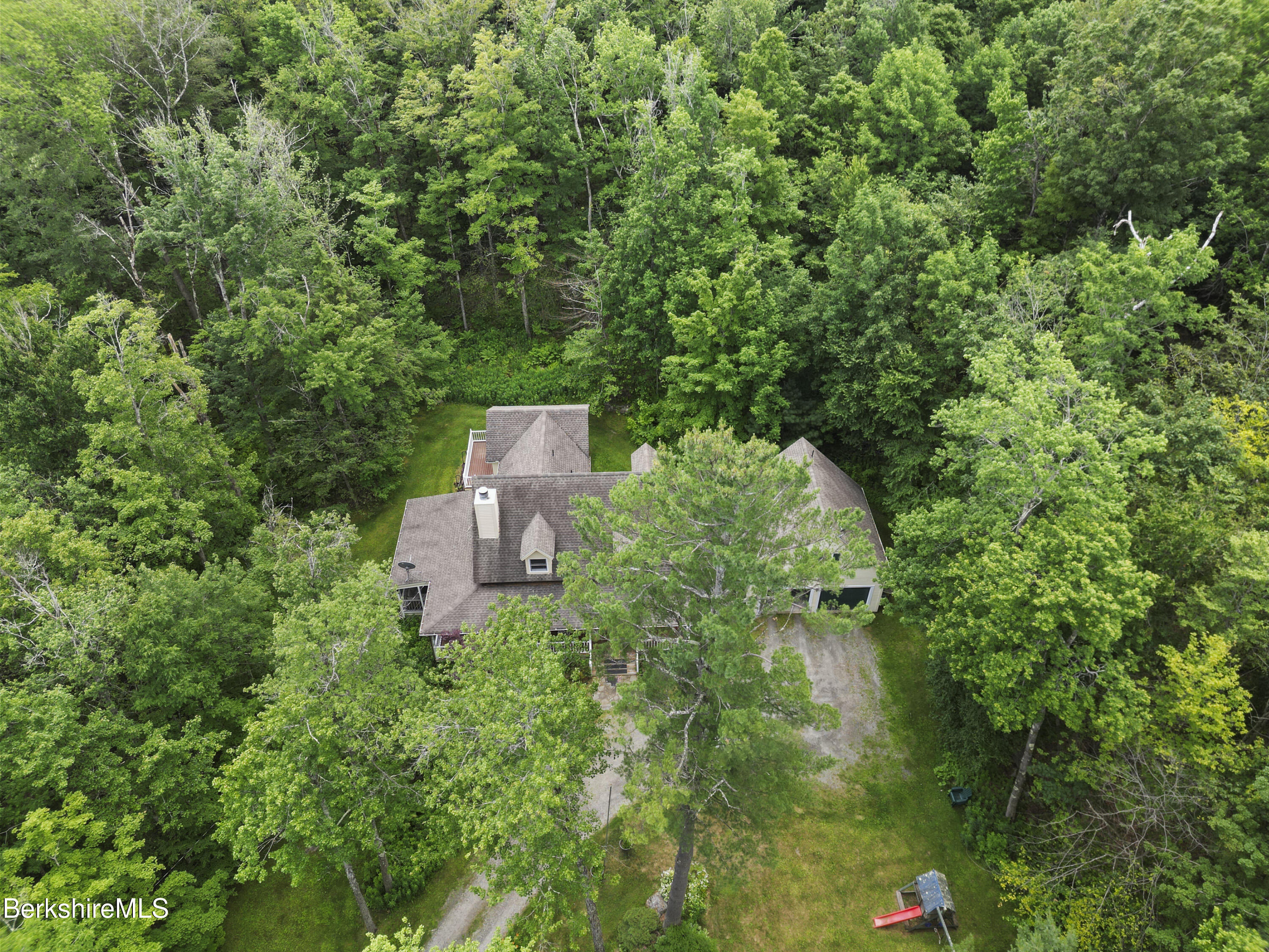 169 Jacobs Hollow Road Becket, MA 01223 - Photo 8 of 73 an aerial view of a house with a yard