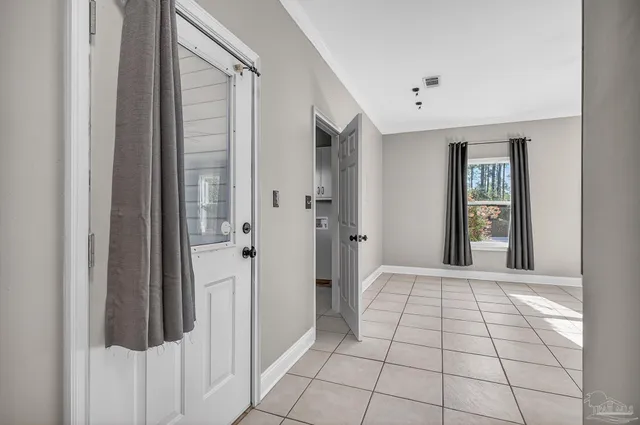 wooden floor with window in an empty room