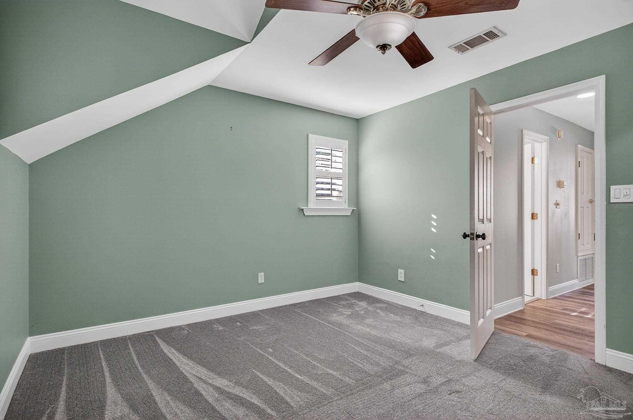 16360 Innerarity Point Road Pensacola, FL 32507 - Photo 33 of 56 a view of an empty room with a window