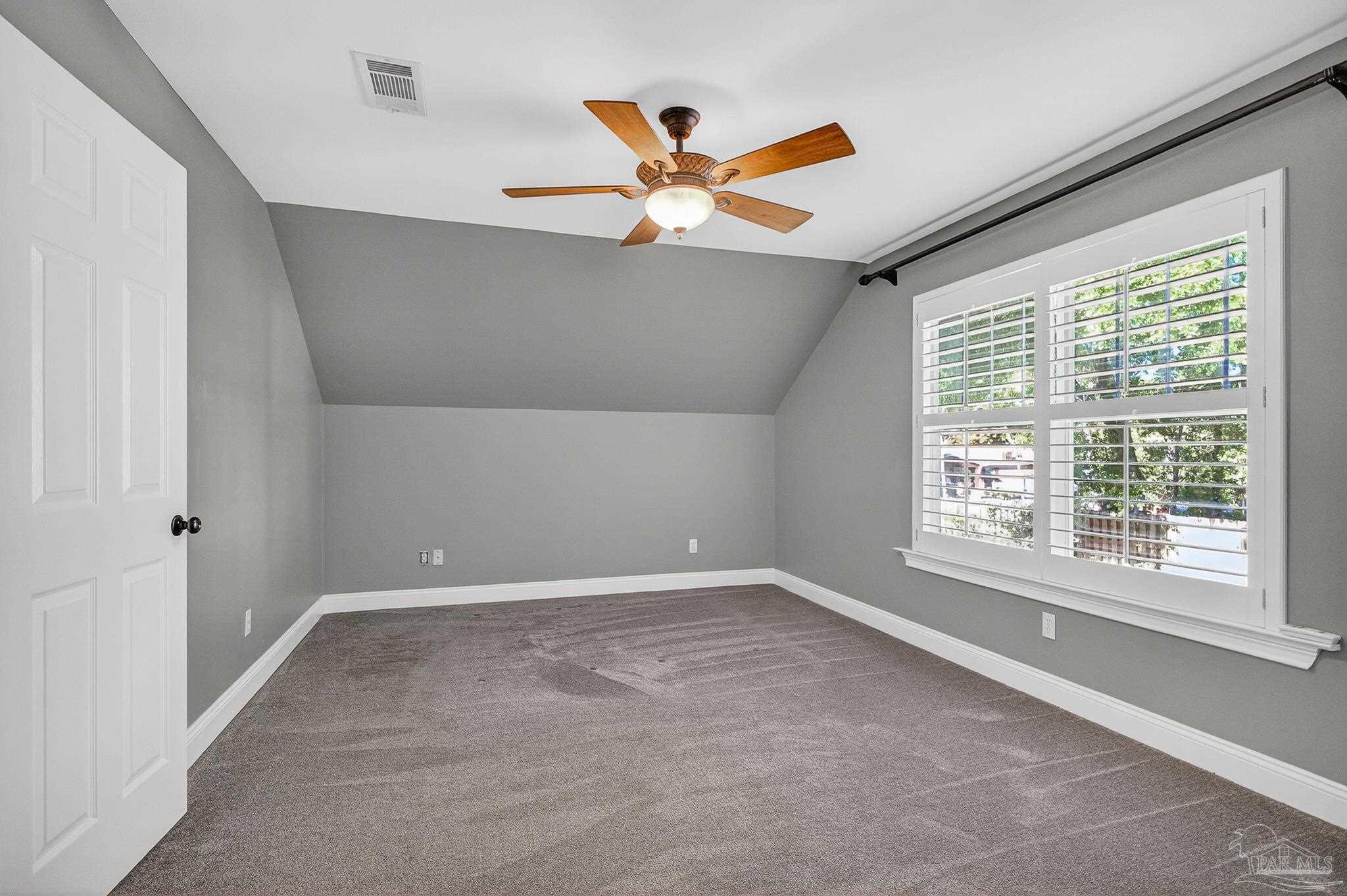 16360 Innerarity Point Road Pensacola, FL 32507 - Photo 41 of 56 a view of an empty room with a window