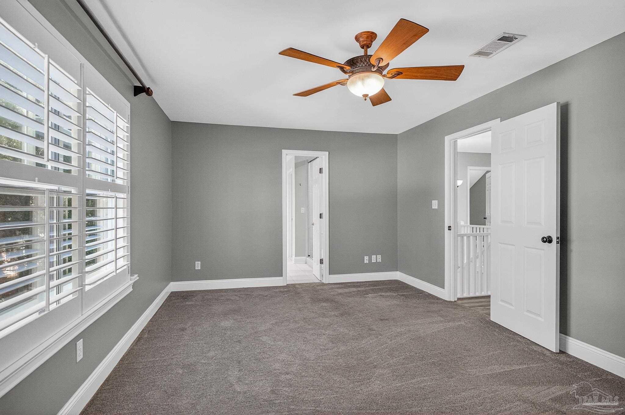 16360 Innerarity Point Road Pensacola, FL 32507 - Photo 42 of 56 a view of an empty room with a window