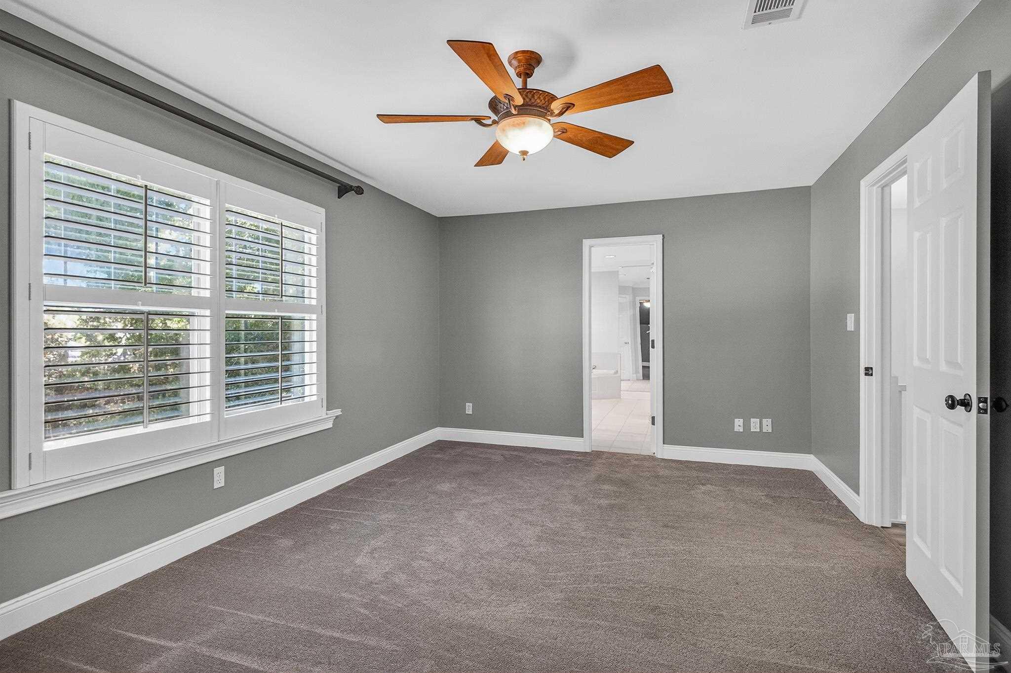 16360 Innerarity Point Road Pensacola, FL 32507 - Photo 43 of 56 a view of an empty room with a window