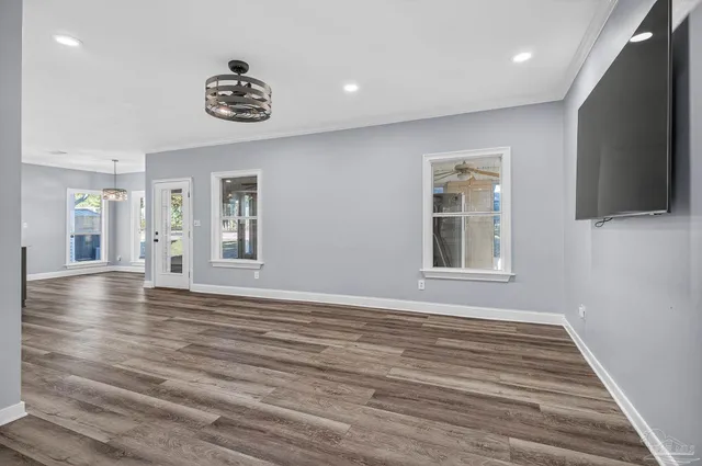 a bathroom with a toilet sink and a mirror