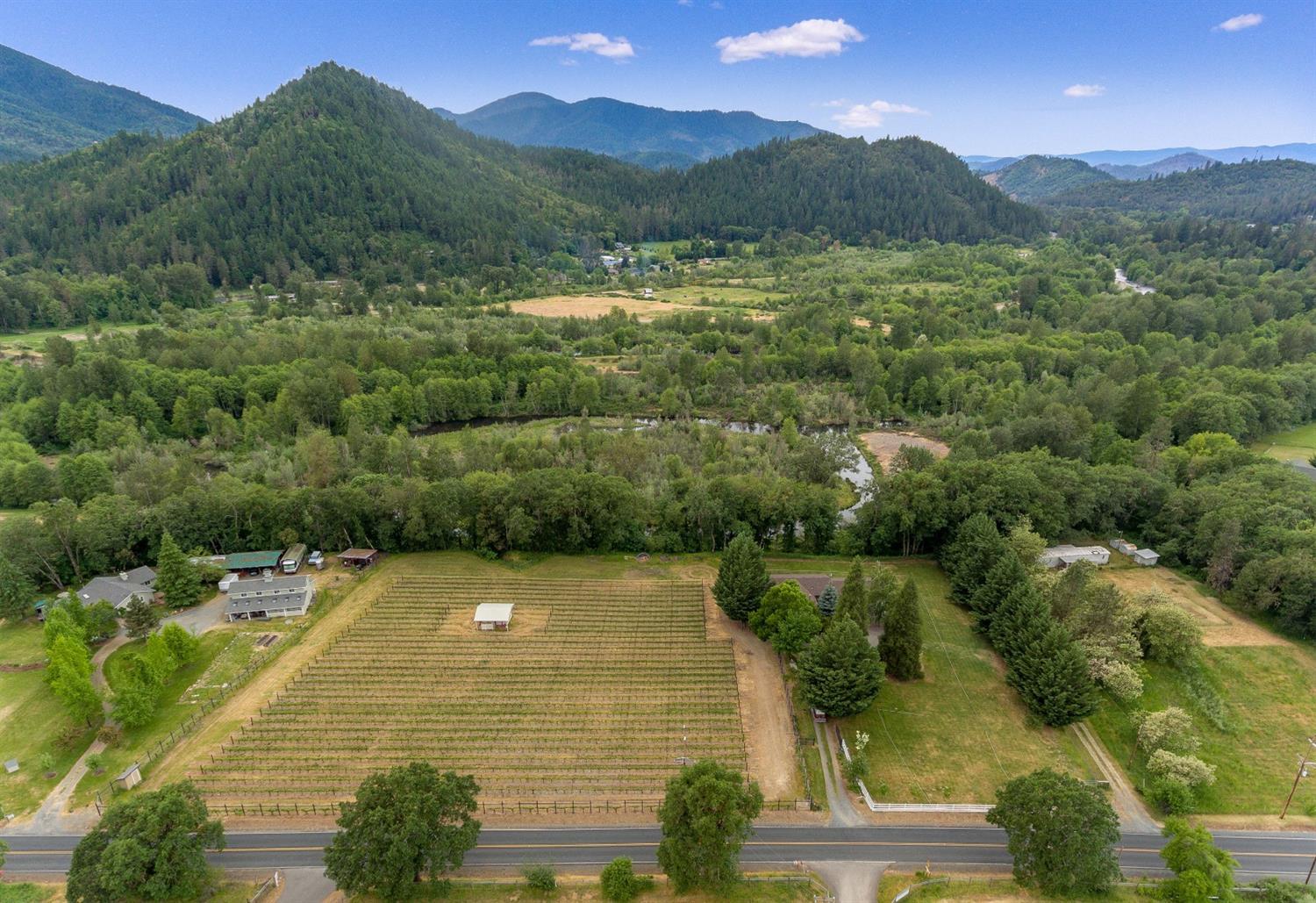 9155 North Applegate Road Grants Pass, OR 97527 - Photo 33 of 35 a view of a swimming pool with a mountain