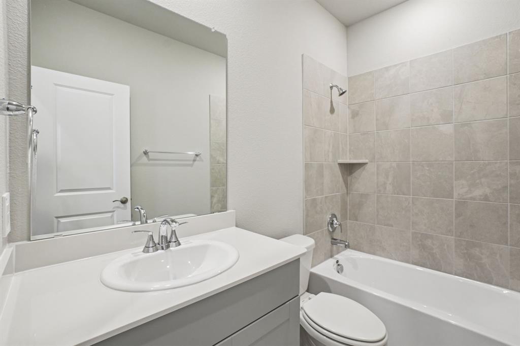 1616 Arches Road Anna, TX 75409 - Photo 19 of 32 Photo is not of the actual home, but is an inspirational photo of builder’s model home and may depict options, furnishings, and/or decorator features that are not included.