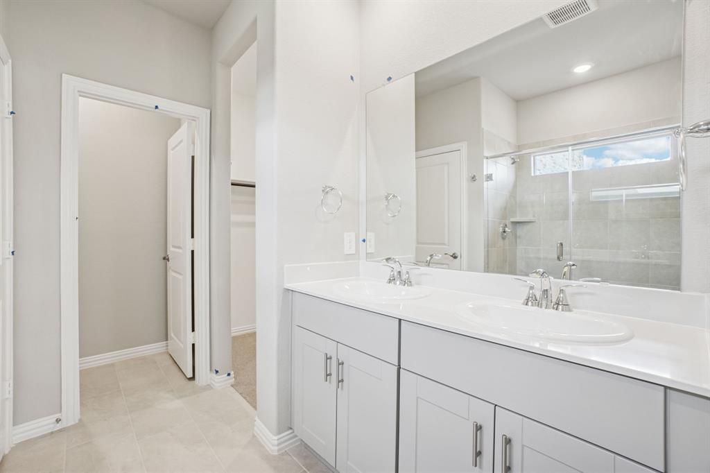 1616 Arches Road Anna, TX 75409 - Photo 29 of 32 Photo is not of the actual home, but is an inspirational photo of builder’s model home and may depict options, furnishings, and/or decorator features that are not included.