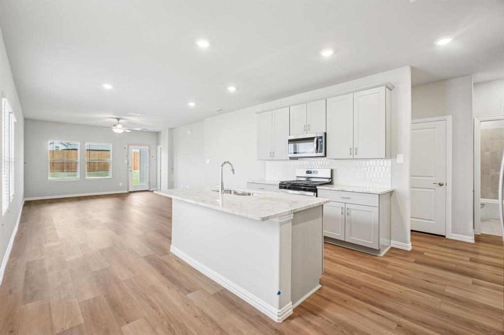 1616 Arches Road Anna, TX 75409 - Photo 3 of 32 Photo is not of the actual home, but is an inspirational photo of builder’s model home and may depict options, furnishings, and/or decorator features that are not included.