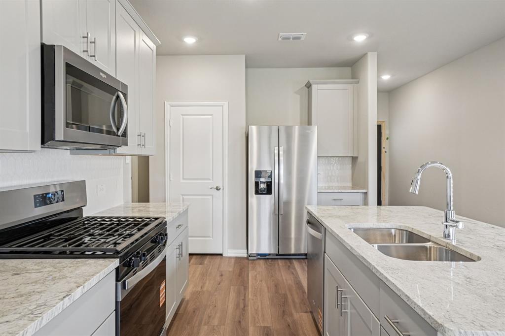 1616 Arches Road Anna, TX 75409 - Photo 4 of 32 Photo is not of the actual home, but is an inspirational photo of builder’s model home and may depict options, furnishings, and/or decorator features that are not included.