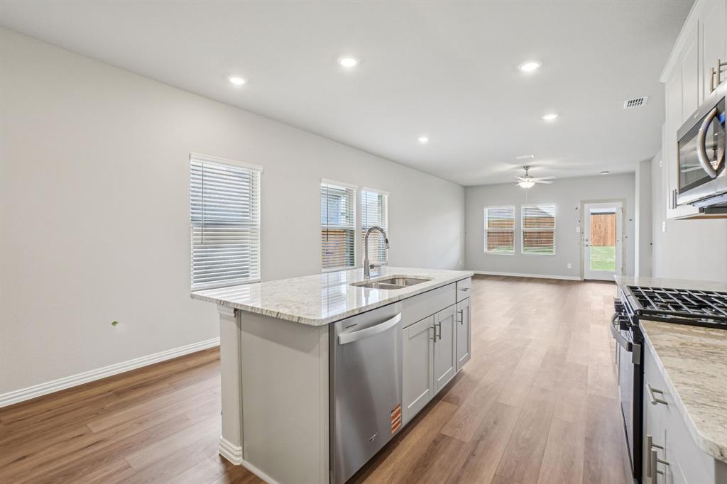 1616 Arches Road Anna, TX 75409 - Photo 5 of 32 Photo is not of the actual home, but is an inspirational photo of builder’s model home and may depict options, furnishings, and/or decorator features that are not included.