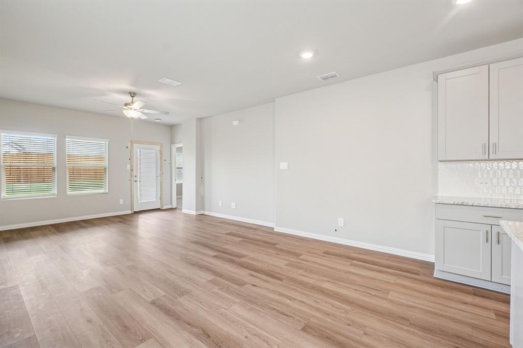 1616 Arches Road Anna, TX 75409 - Photo 6 of 32 Photo is not of the actual home, but is an inspirational photo of builder’s model home and may depict options, furnishings, and/or decorator features that are not included.