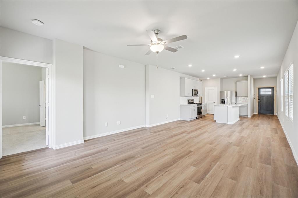 1616 Arches Road Anna, TX 75409 - Photo 7 of 32 Photo is not of the actual home, but is an inspirational photo of builder’s model home and may depict options, furnishings, and/or decorator features that are not included.