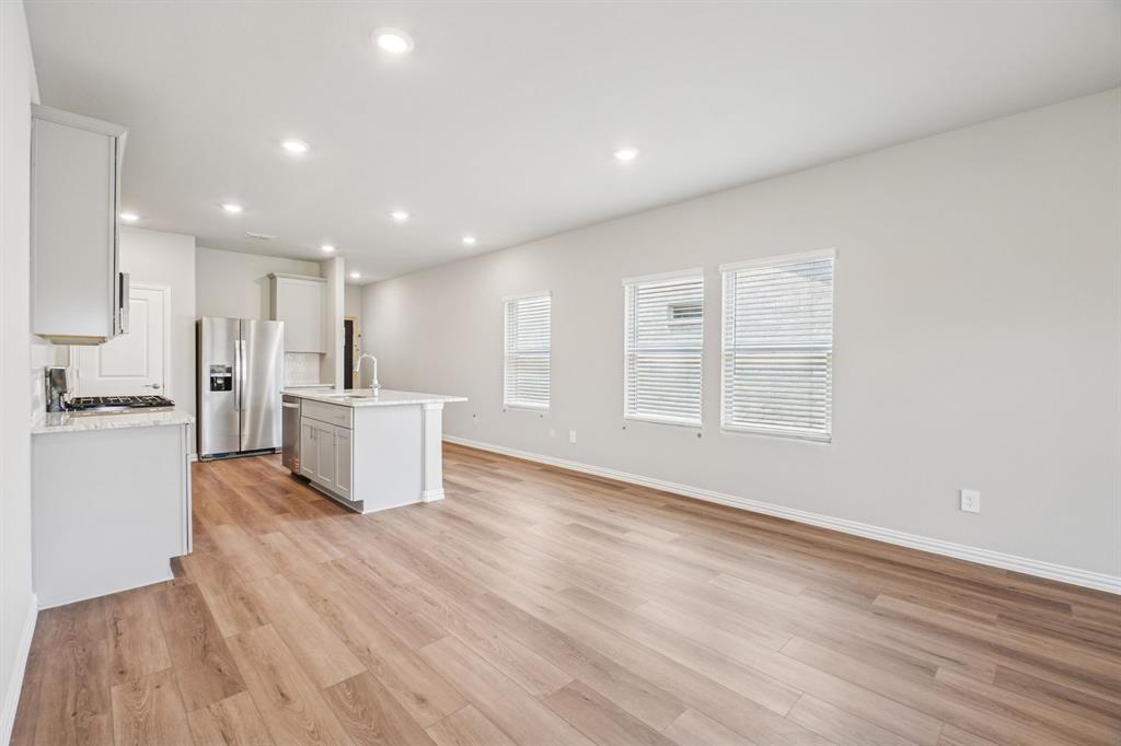 1616 Arches Road Anna, TX 75409 - Photo 8 of 32 Photo is not of the actual home, but is an inspirational photo of builder’s model home and may depict options, furnishings, and/or decorator features that are not included.