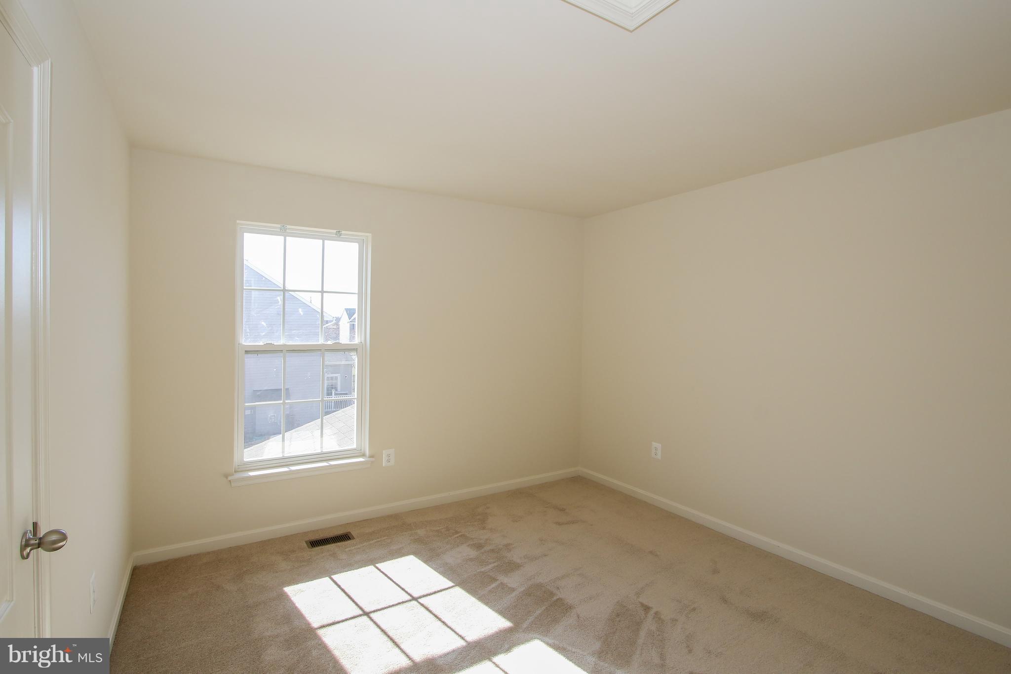 3905 Calico Circle Point of Rocks, MD 21777 - Photo 19 of 30 an empty room with windows