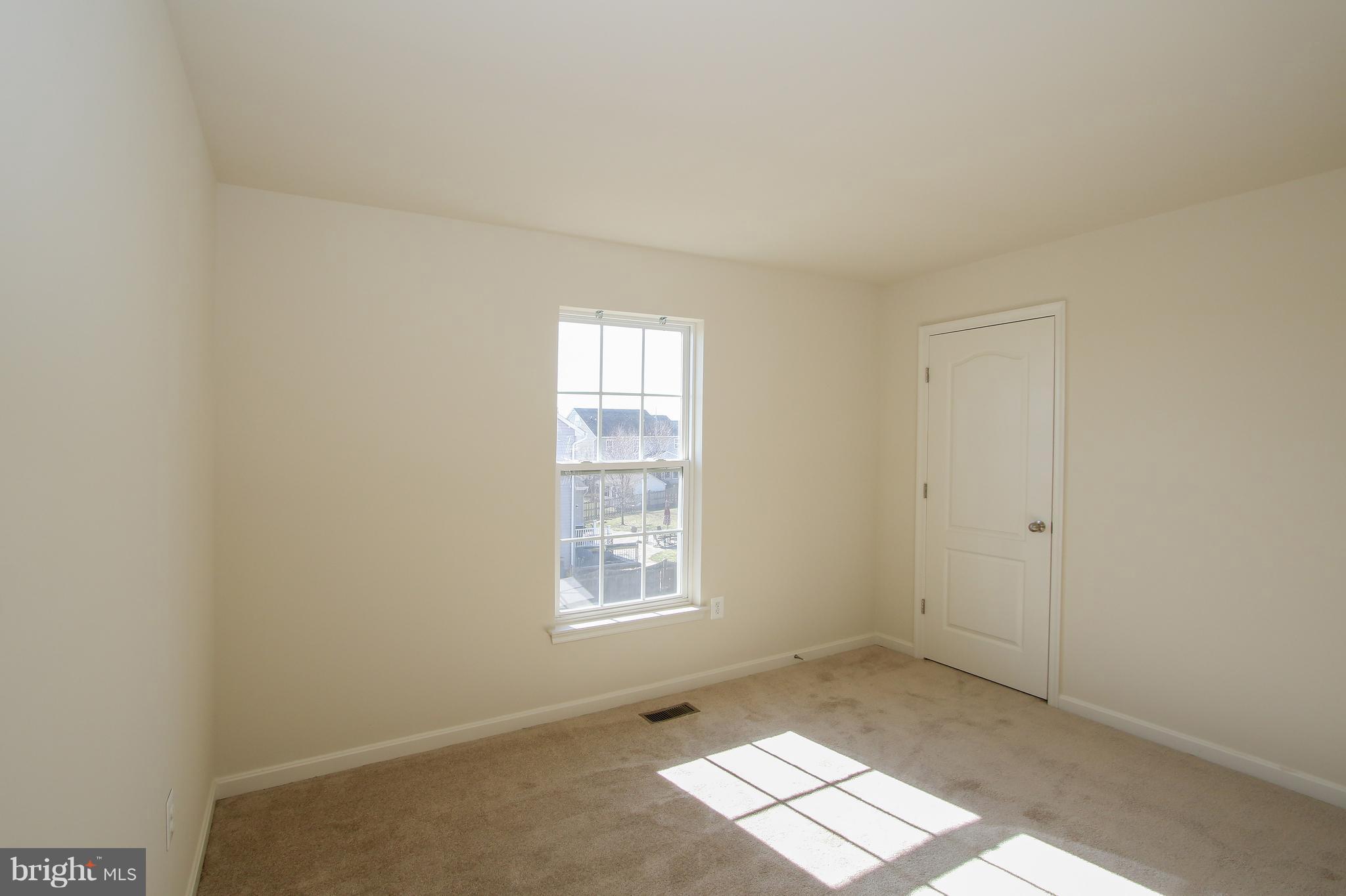 3905 Calico Circle Point of Rocks, MD 21777 - Photo 22 of 30 an empty room with windows