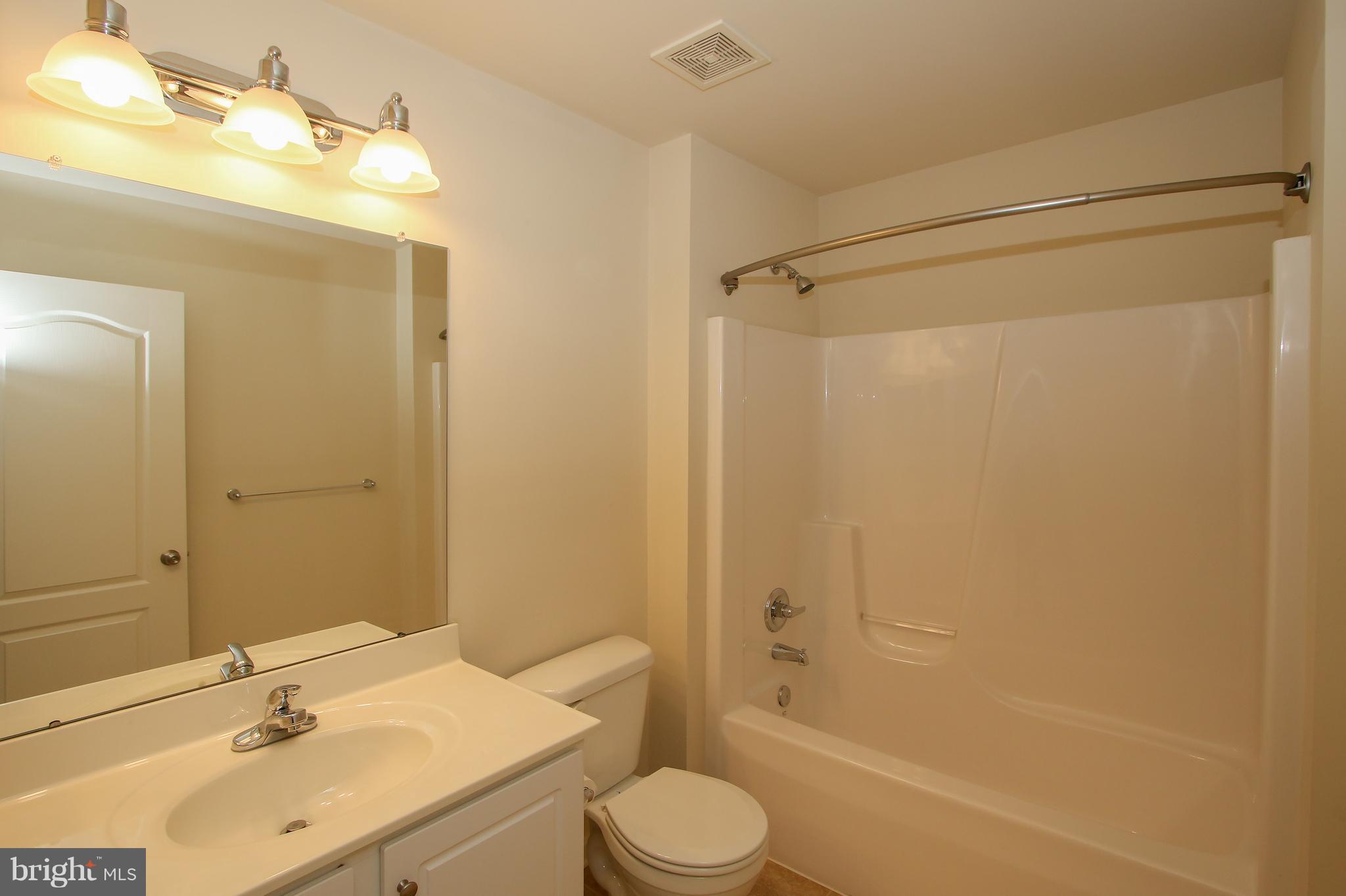 3905 Calico Circle Point of Rocks, MD 21777 - Photo 24 of 30 a bathroom with a sink toilet and shower