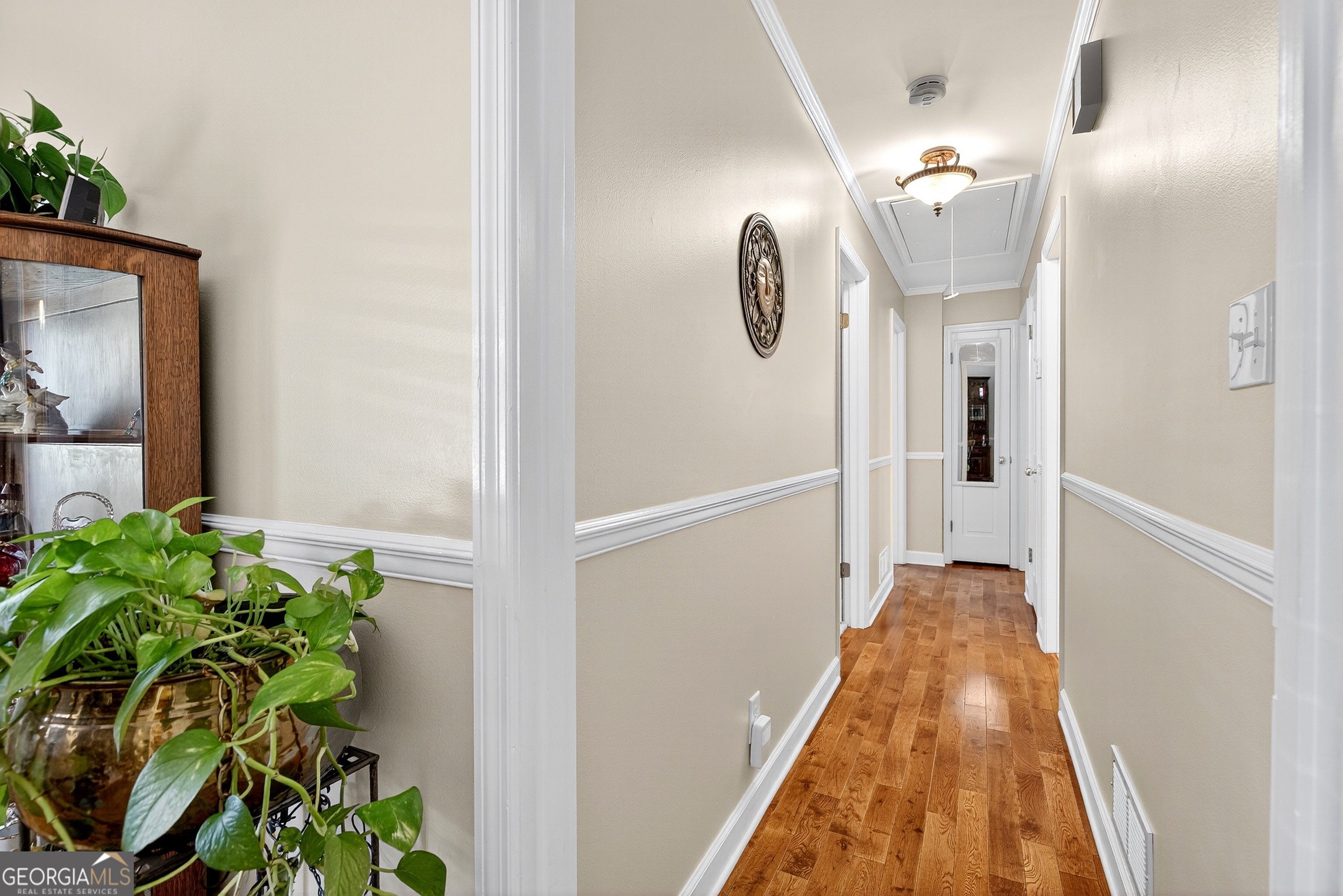 466 Minter Drive Hampton, GA 30228 - Photo 11 of 81 This hall when you come into the home leads to the bedrooms. You could even add a door for added privacy for this area if you desired! This is yet again where this home shines, offering options to make it work for you!