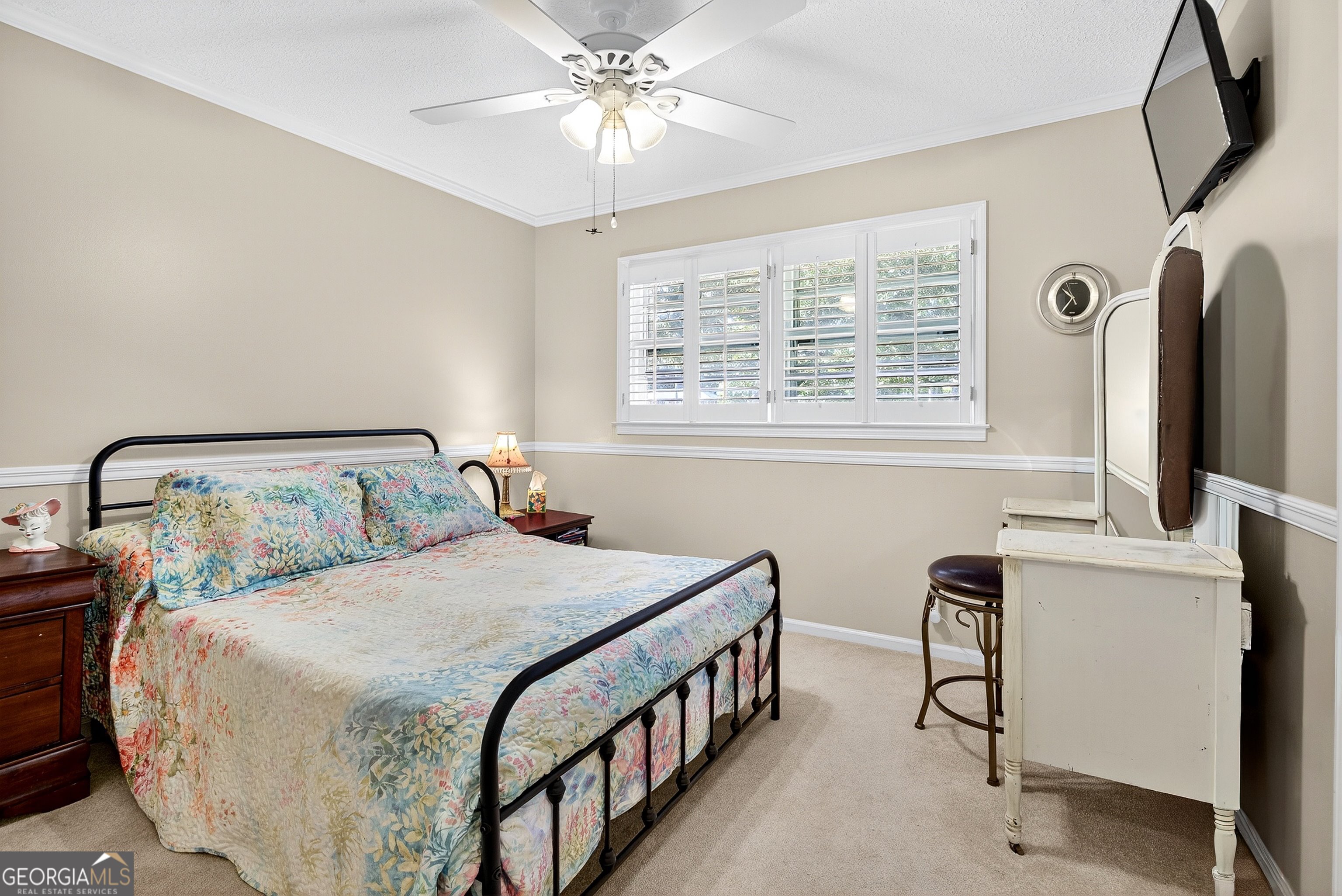 466 Minter Drive Hampton, GA 30228 - Photo 12 of 81 a bedroom with double bed and a window