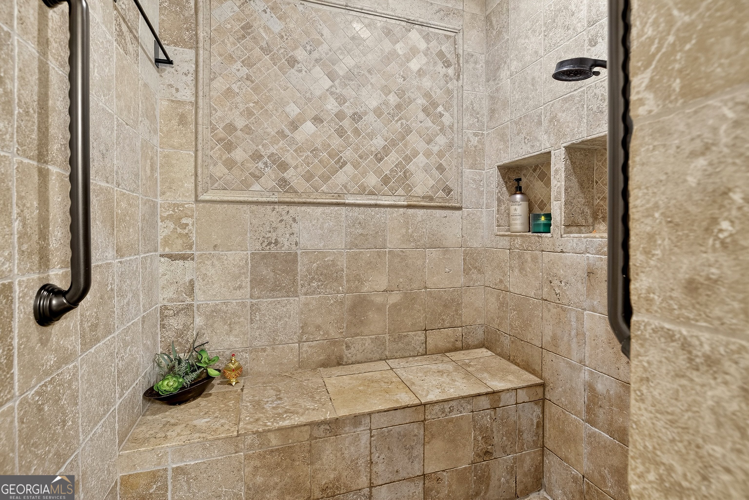 466 Minter Drive Hampton, GA 30228 - Photo 14 of 81 This shower in the full bathroom is truly right out of a spa! This stunning shower also features a huge shower seat which is also a great, and appreciated, addition!