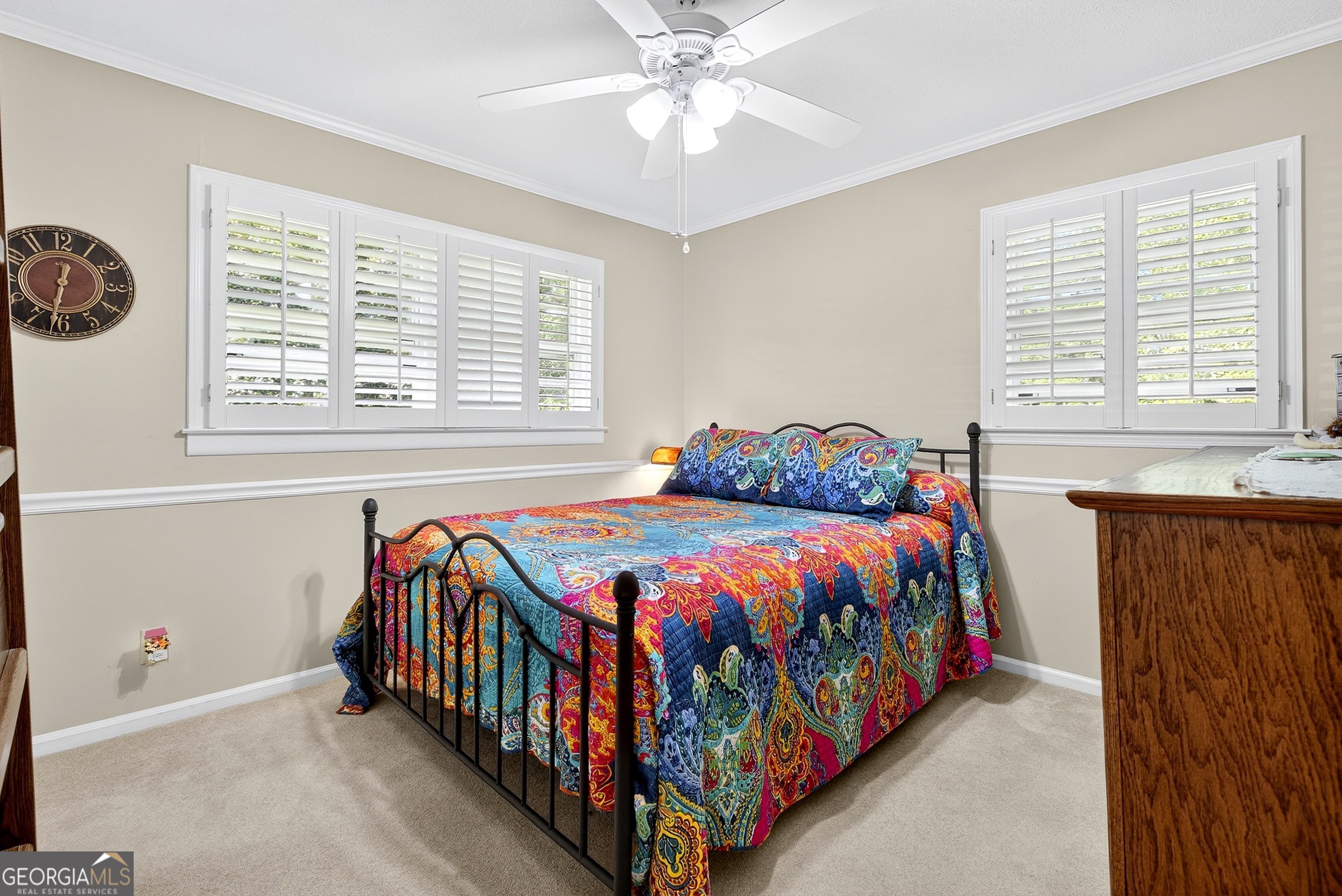 466 Minter Drive Hampton, GA 30228 - Photo 15 of 81 a bedroom with a bed and a window