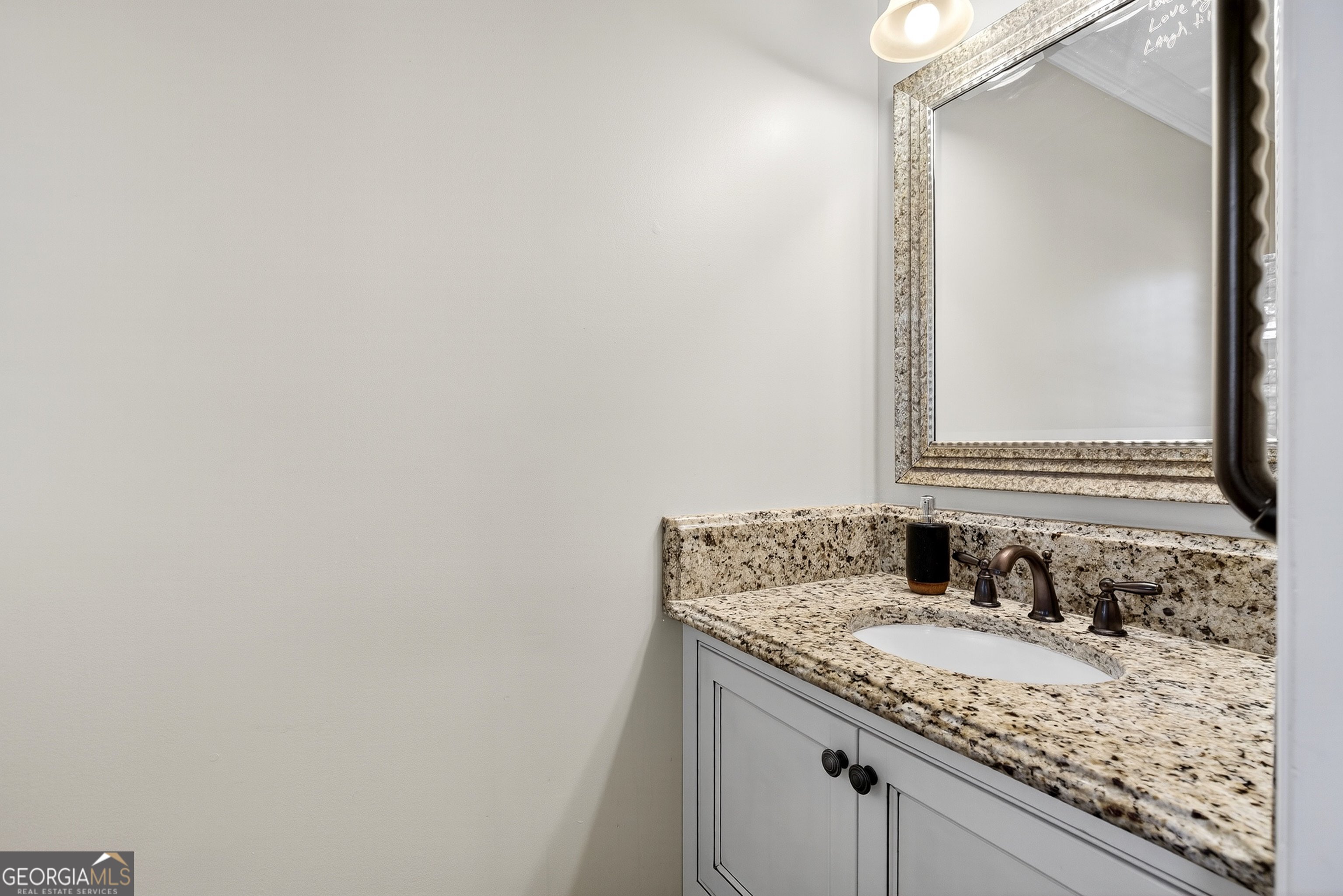 466 Minter Drive Hampton, GA 30228 - Photo 18 of 81 This half bath was not spared when upgrades were considered! This space also offers you upgraded counter and attention to detail. So much thought and quality everywhere in this home, even the smallest of spaces.