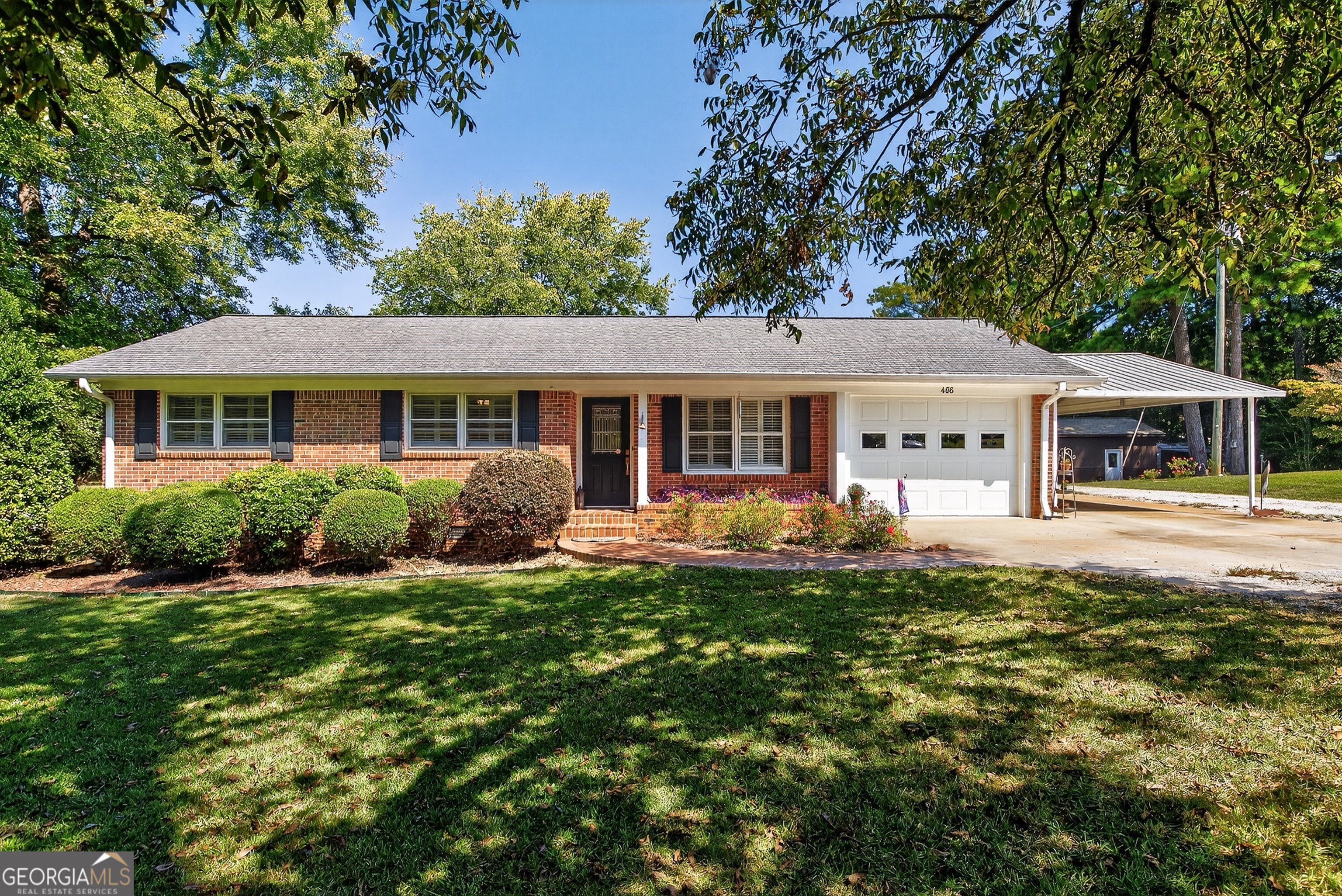 466 Minter Drive Hampton, GA 30228 - Photo 2 of 81 a front view of a house with a yard