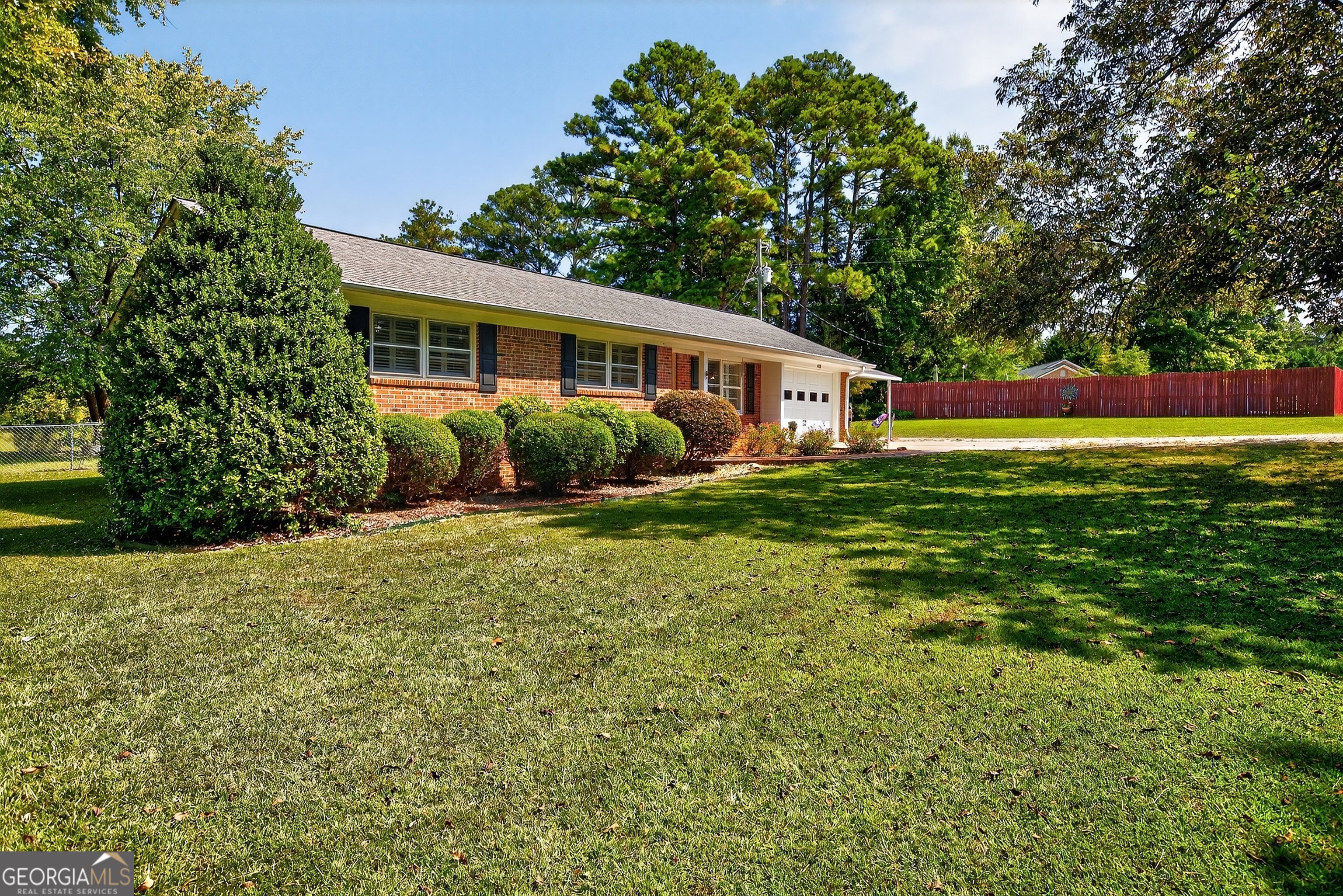 466 Minter Drive Hampton, GA 30228 - Photo 29 of 81 a front view of a house with a yard