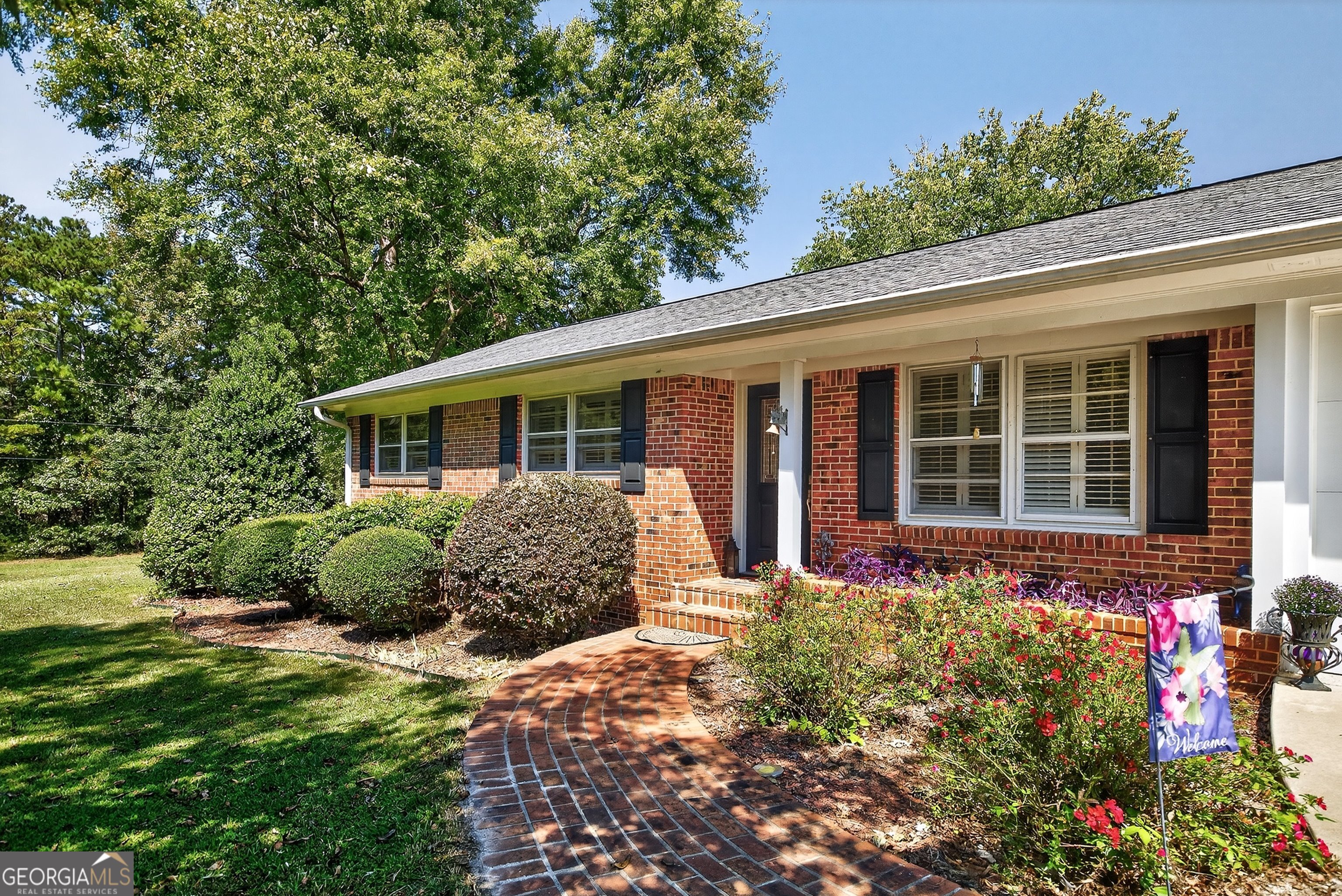 466 Minter Drive Hampton, GA 30228 - Photo 3 of 81 This main home offer 3 bedrooms, and 1.5 full bathrooms. There is tons of storage in the garage and additional parking in the carport.