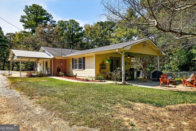 a kitchen with cabinets and a refrigerator