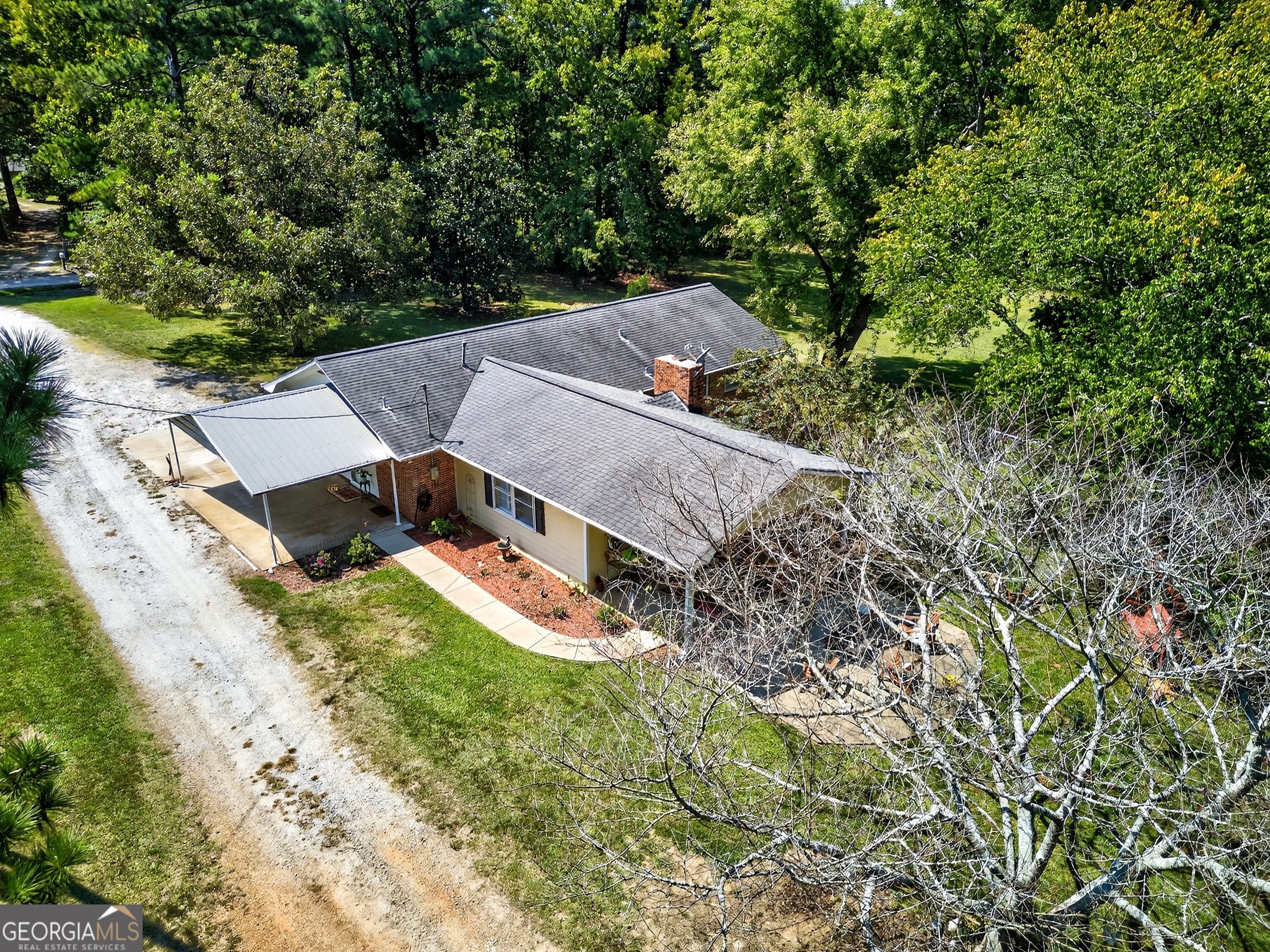 466 Minter Drive Hampton, GA 30228 - Photo 34 of 81 an aerial view of a house with a yard