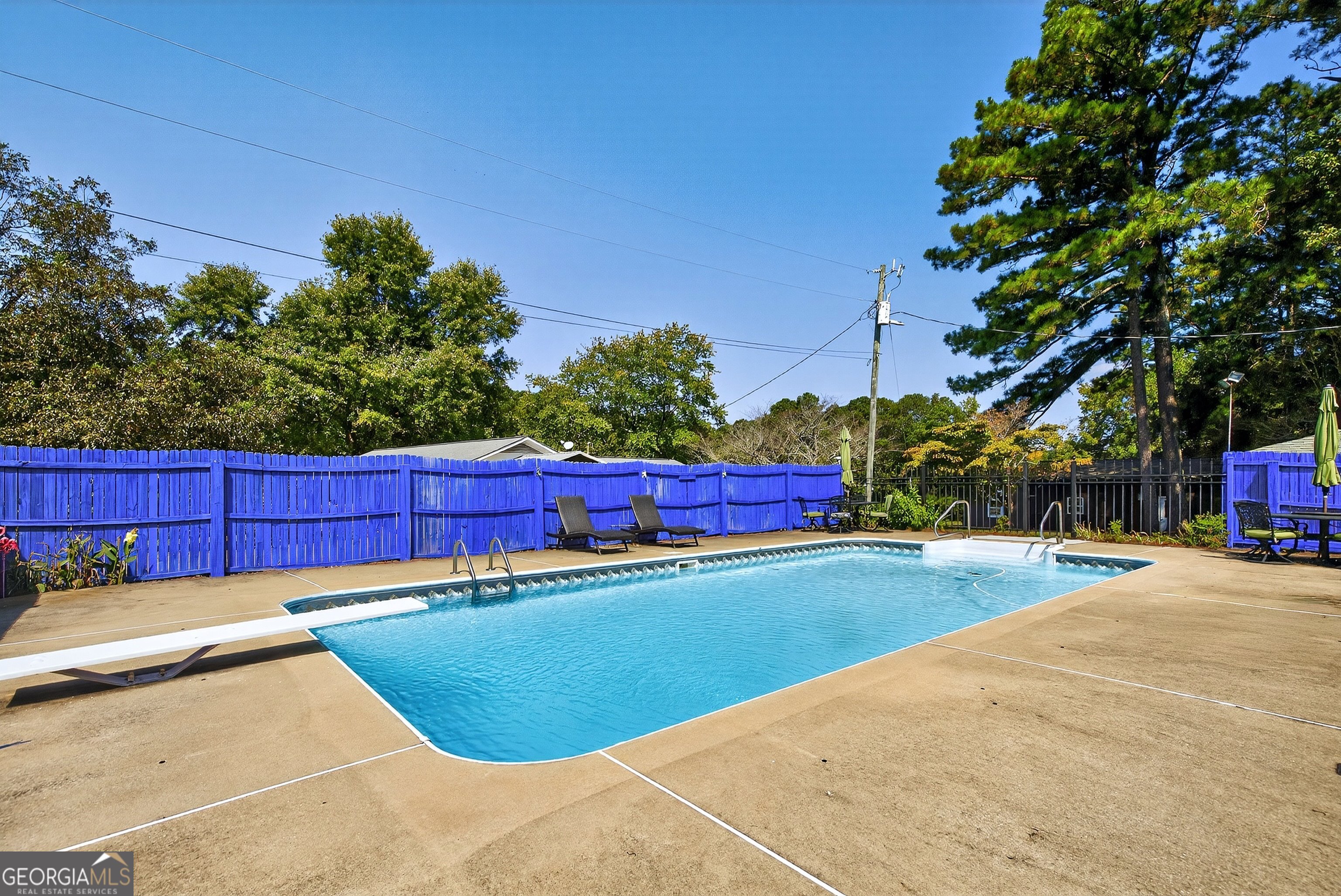 466 Minter Drive Hampton, GA 30228 - Photo 36 of 81 Imagine hosting gatherings here during our hot Georgia summers! You and your guests will love having this place to cool off and let the good times roll! Plenty of space for lounge chairs, tables, and umbrellas.